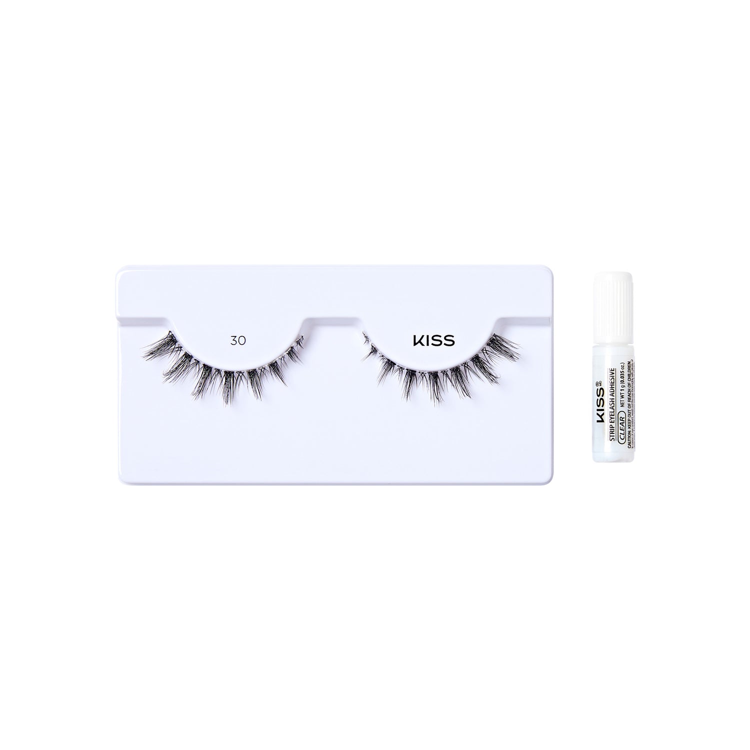 The image shows a set of false eyelashes from the brand "KISS." The eyelashes are displayed on a white tray with two pairs of lashes labeled "30." The lashes are long and voluminous, designed to enhance the appearance of natural eyelashes. To the right of the tray, there is a small tube of adhesive glue, also branded with "KISS," which is used to apply the false eyelashes. The overall presentation is clean and minimalistic, emphasizing the product&