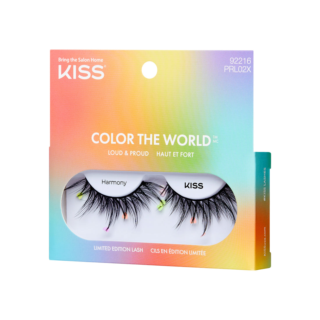 The image shows a package of false eyelashes from the brand "KISS." The product is named "Color the World" and features the style "Loud &amp; Proud." The packaging is colorful, with a gradient of pink, orange, and blue hues. The lashes themselves are black with multicolored tips, adding a vibrant touch. The package also mentions "Limited Edition Lash" and has the product code "92216 PRL02X." The tagline "Bring the Salon Home" is displayed at the top left corner of the package.