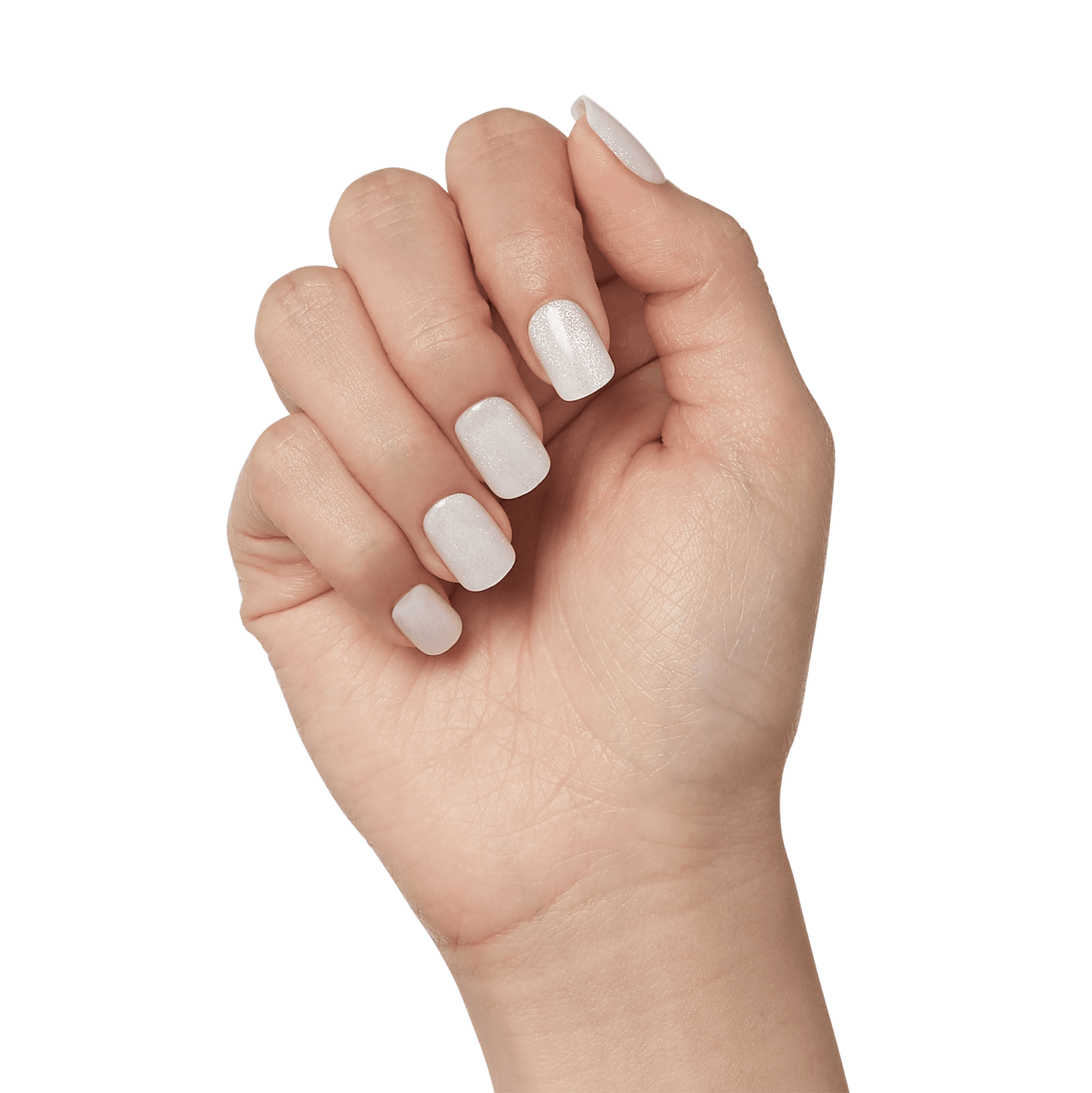Hand with five short, square press-on nails in a shimmery off-white color, shown from the back with fingers slightly curled.