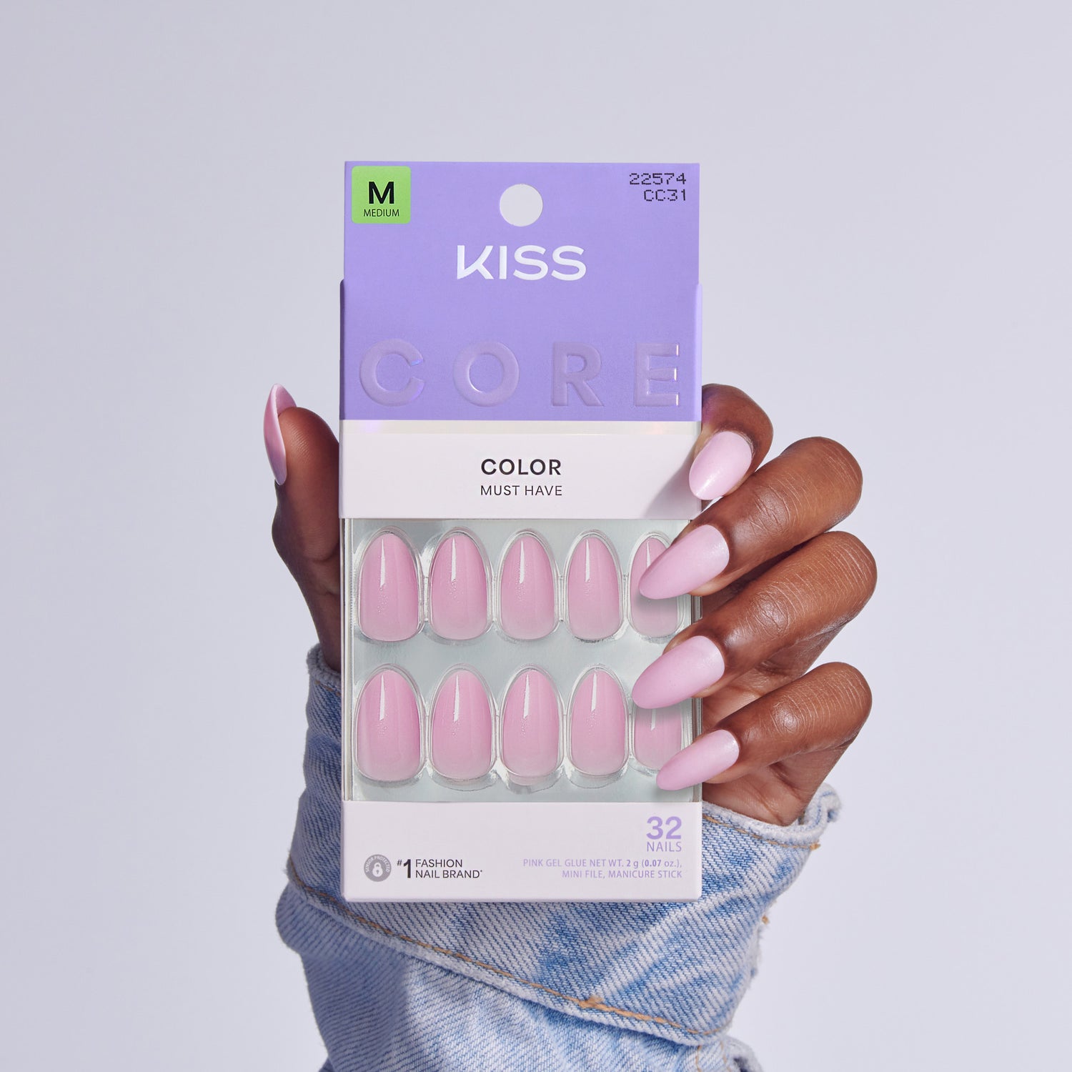 Kiss Core Color Must Have press-on nails in pink, size M, displayed on hand.
