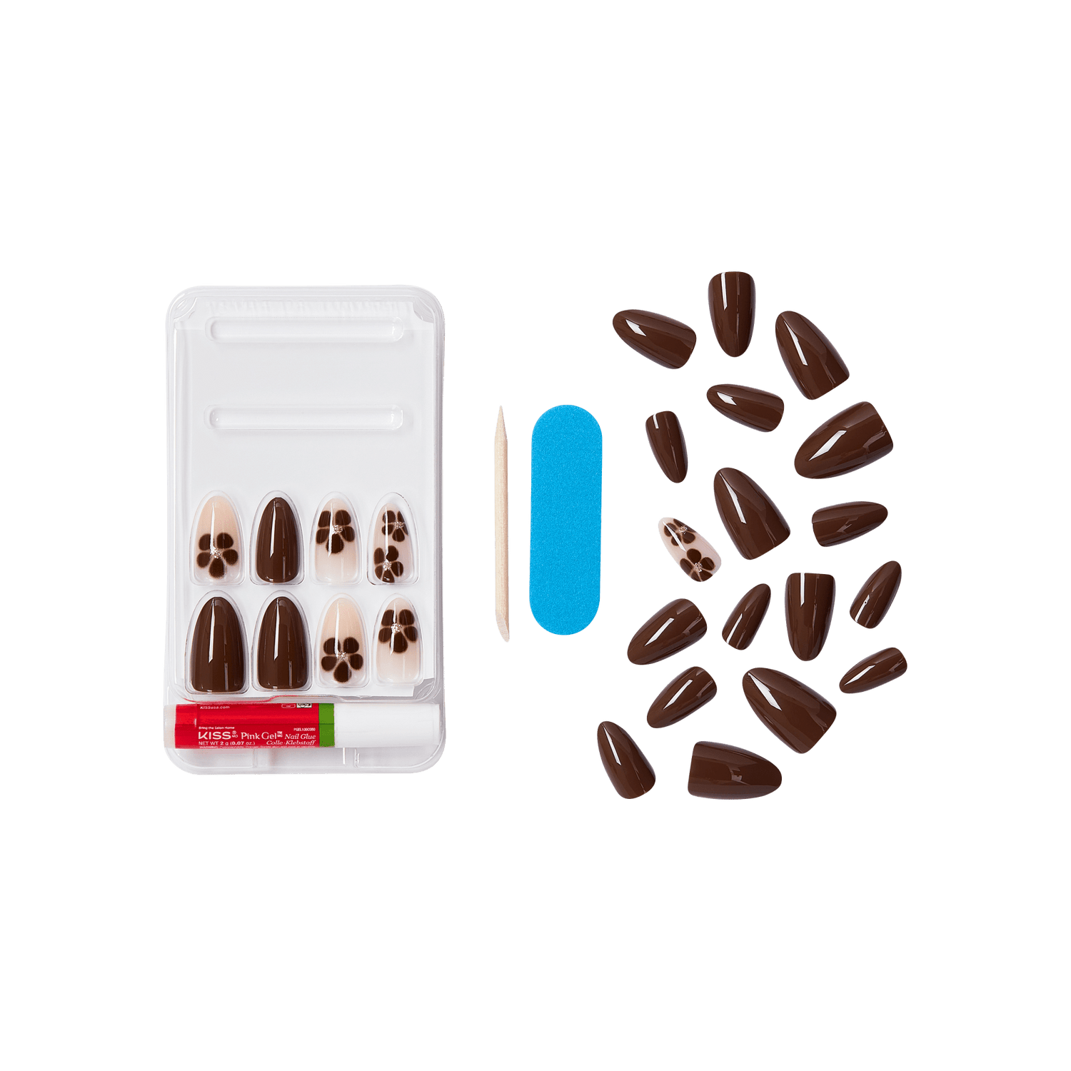 The image features a set of artificial nails arranged neatly in a plastic tray. The nails include a variety of designs, with some being a solid dark brown color and others featuring a light brown base with a paw print design. Next to the tray, there are additional nails scattered around, along with a blue nail file, a wooden cuticle stick, and a tube of nail adhesive. The overall presentation is clean and organized, showcasing the nail designs and tools for application.