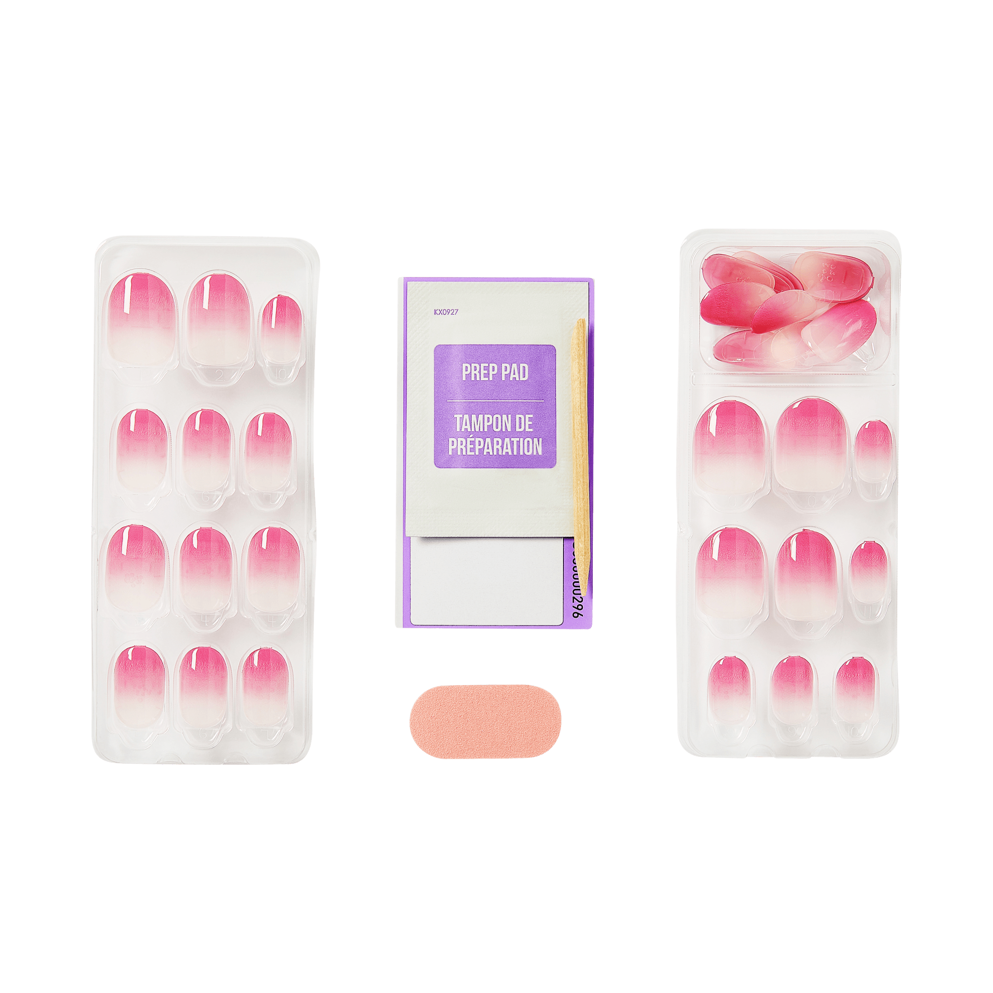 The image features a nail kit that includes two trays of artificial nails, each displaying a gradient design that transitions from a light pink to a darker pink at the tips. In the center, there is a prep pad for nail preparation, along with a wooden cuticle stick. A small pink nail file is also visible, positioned at the bottom of the image. The overall arrangement suggests a complete set for applying the artificial nails.