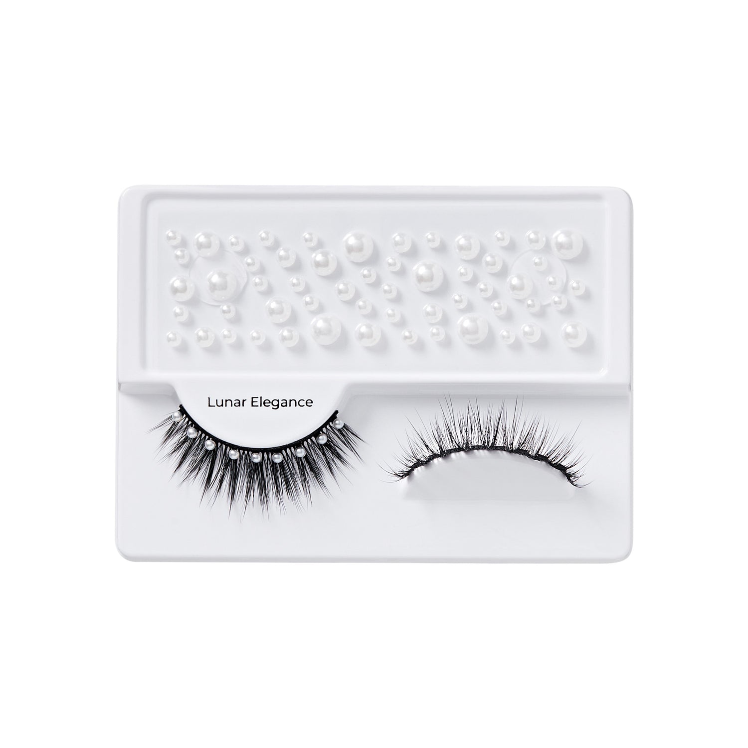 Lunar Elegance false eyelashes in white packaging with pearl embellishments
