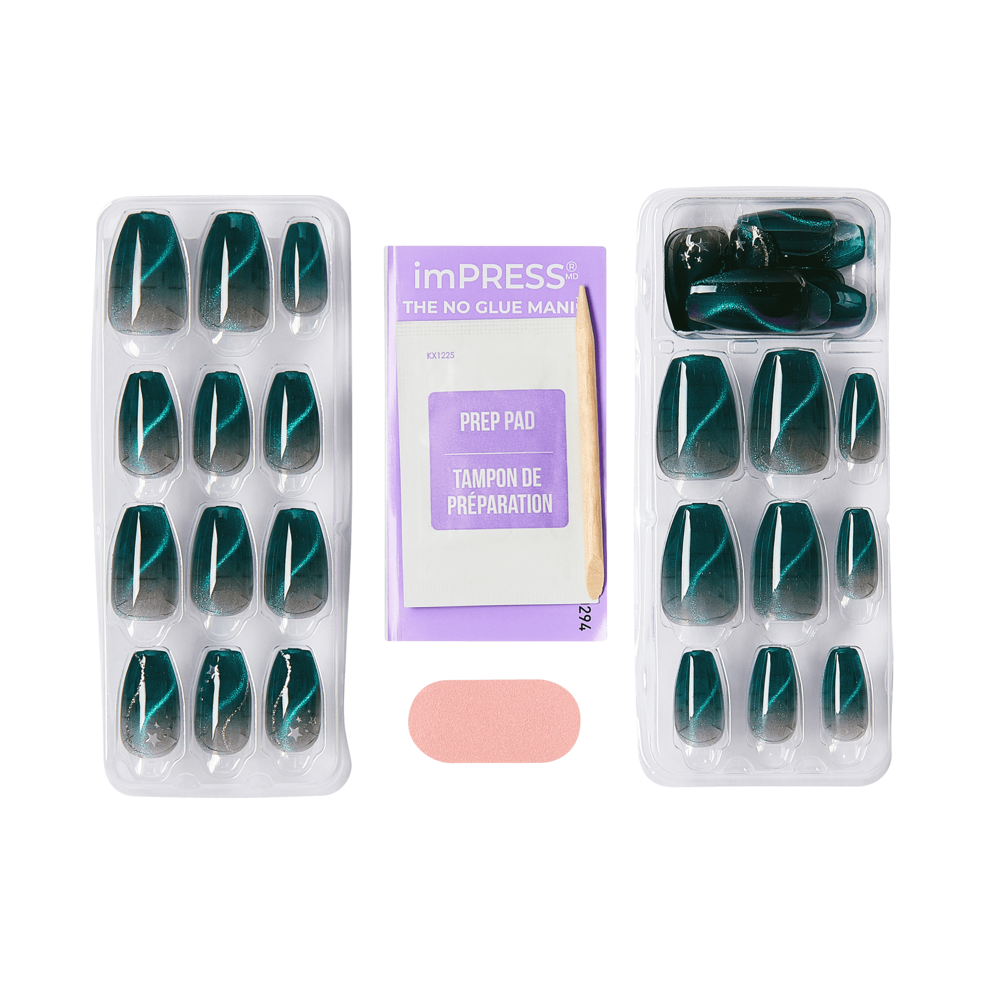Two trays of press-on nails with a dark teal to black ombré design and silver star accents, accompanied by a purple prep pad packet and a wooden cuticle stick.