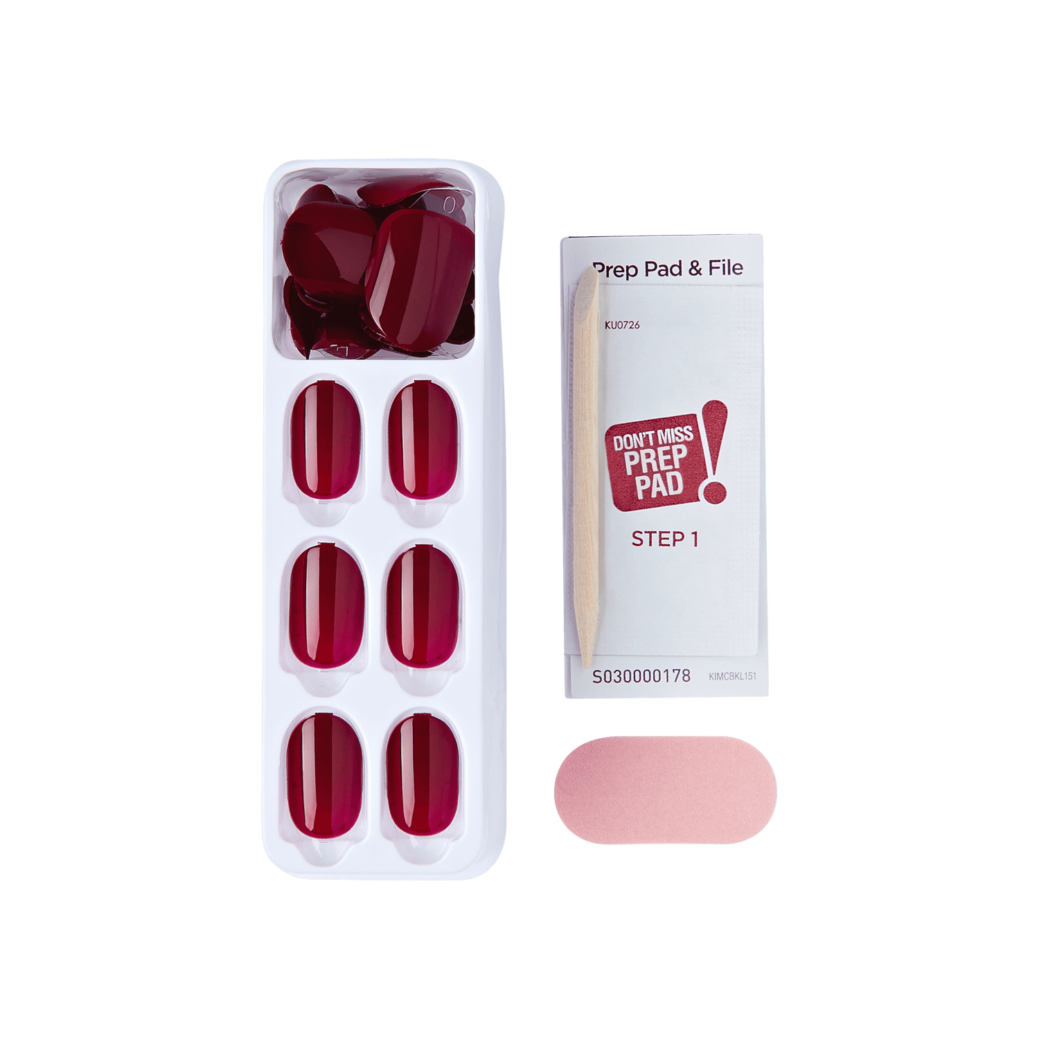 The image shows a set of artificial nails and related accessories. The set includes a white plastic tray containing eight red artificial nails of varying sizes. Next to the tray is a small rectangular box labeled "Prep Pad &amp; File" with the instruction "STEP 1" and a note saying "DON&