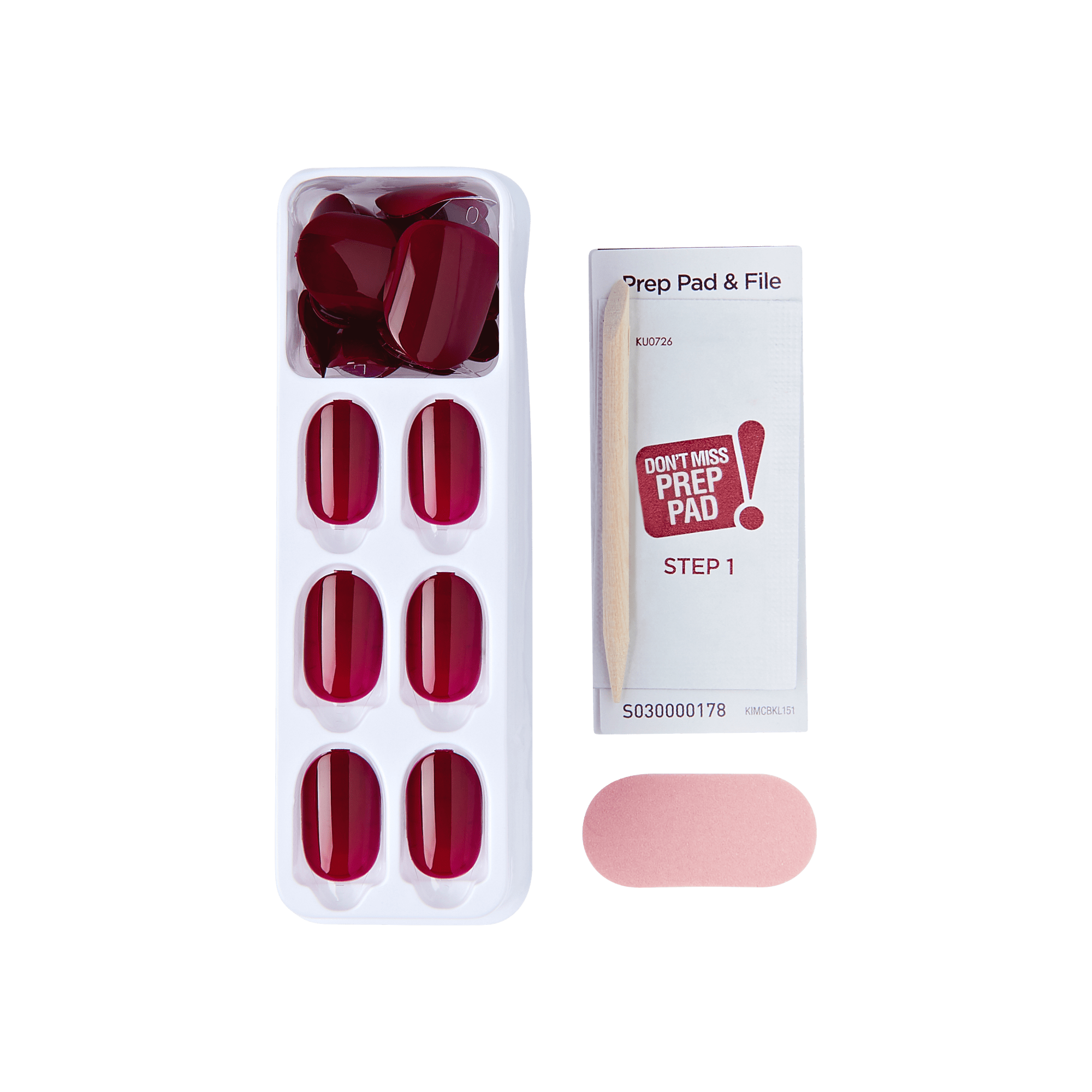 The image shows a set of artificial nails and related accessories. The set includes a white plastic tray containing eight red artificial nails of varying sizes. Next to the tray is a small rectangular box labeled "Prep Pad &amp; File" with the instruction "STEP 1" and a note saying "DON&
