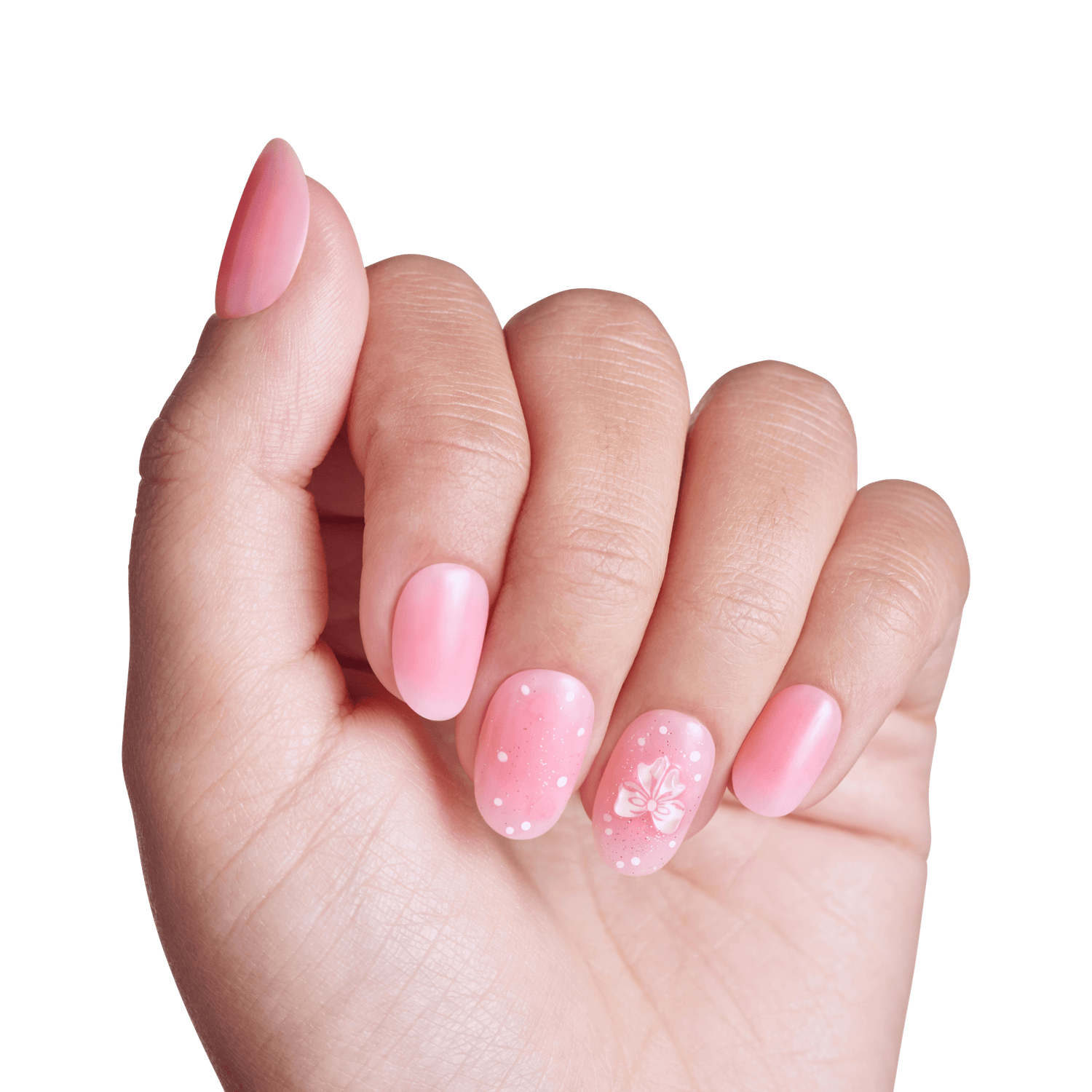 Close-up of hand displaying pink gel manicure with floral and pearl nail art designs.