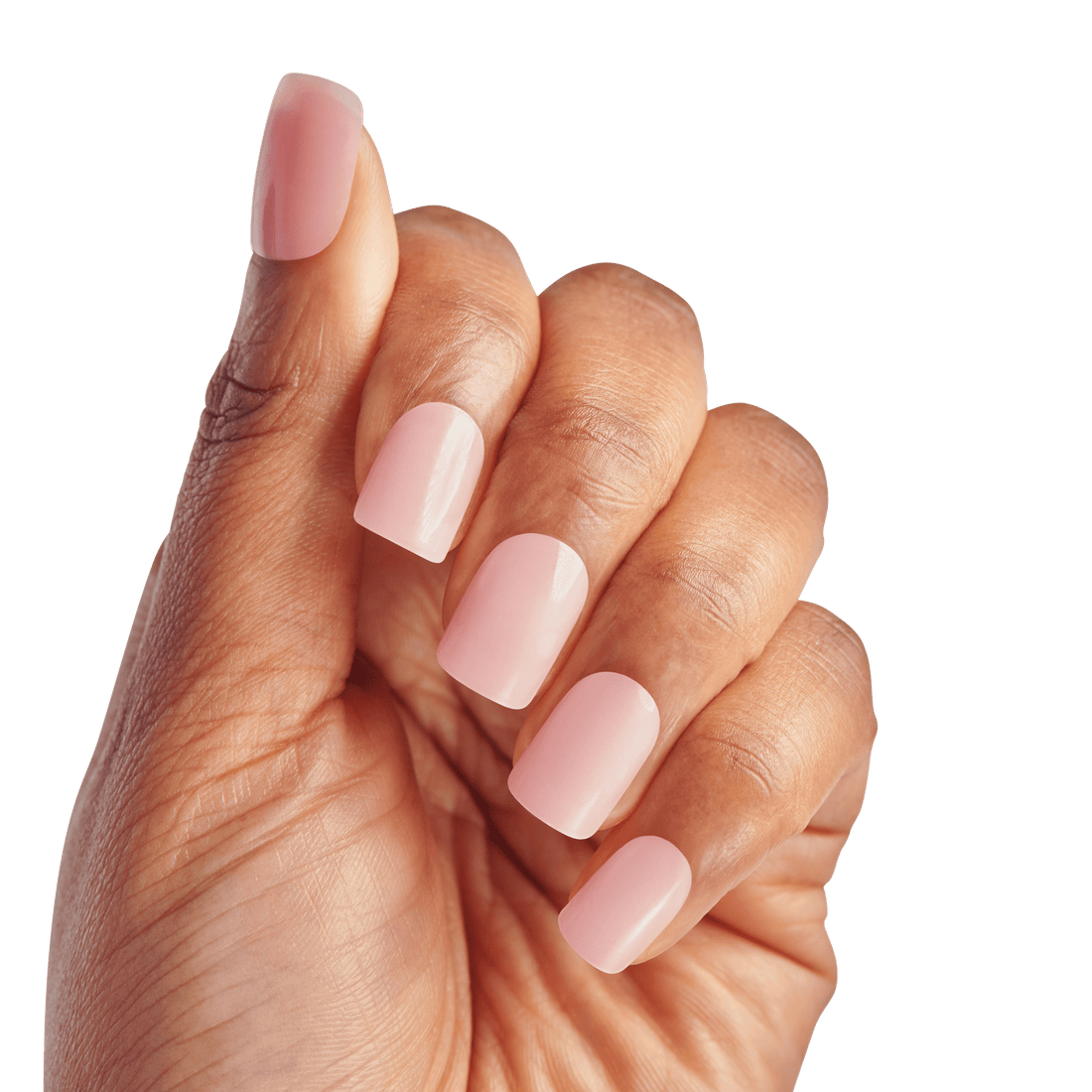 The image features a hand displaying a manicure with neatly shaped nails. The nails are painted in a soft, translucent pink shade, giving them a polished and elegant appearance. The hand is positioned with fingers slightly curled, showcasing the nails against a plain white background, which emphasizes their color and shine.