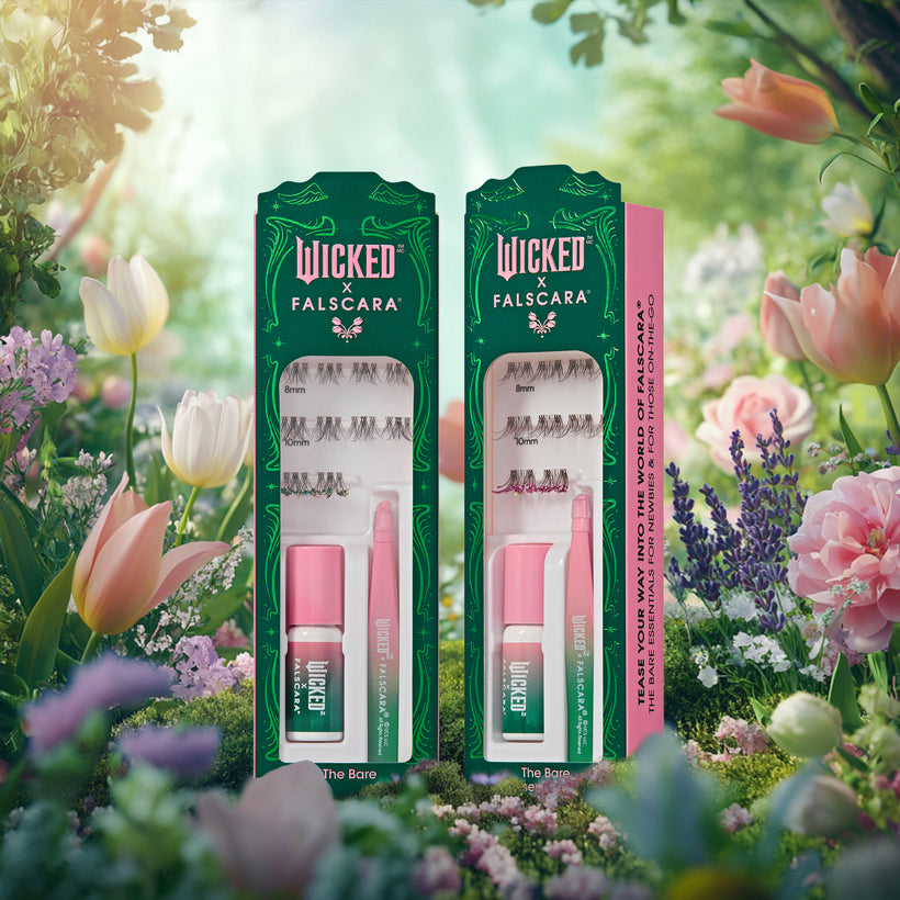 Wicked x Falscara false eyelash sets with pink mascara displayed in garden setting.