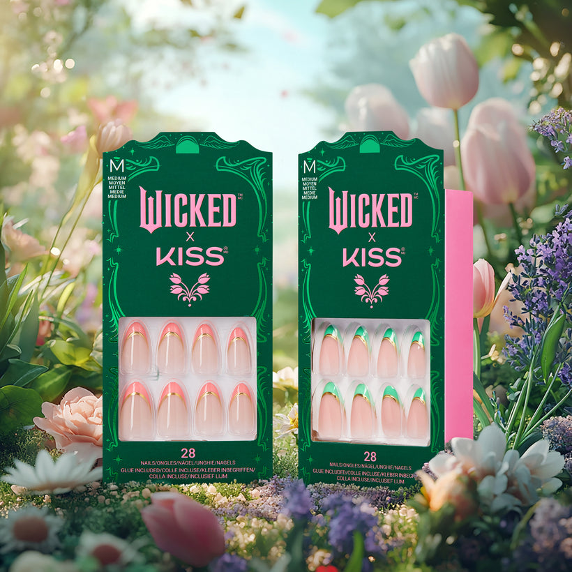 Wicked x KISS press-on nails in pink and green designs displayed in garden setting.