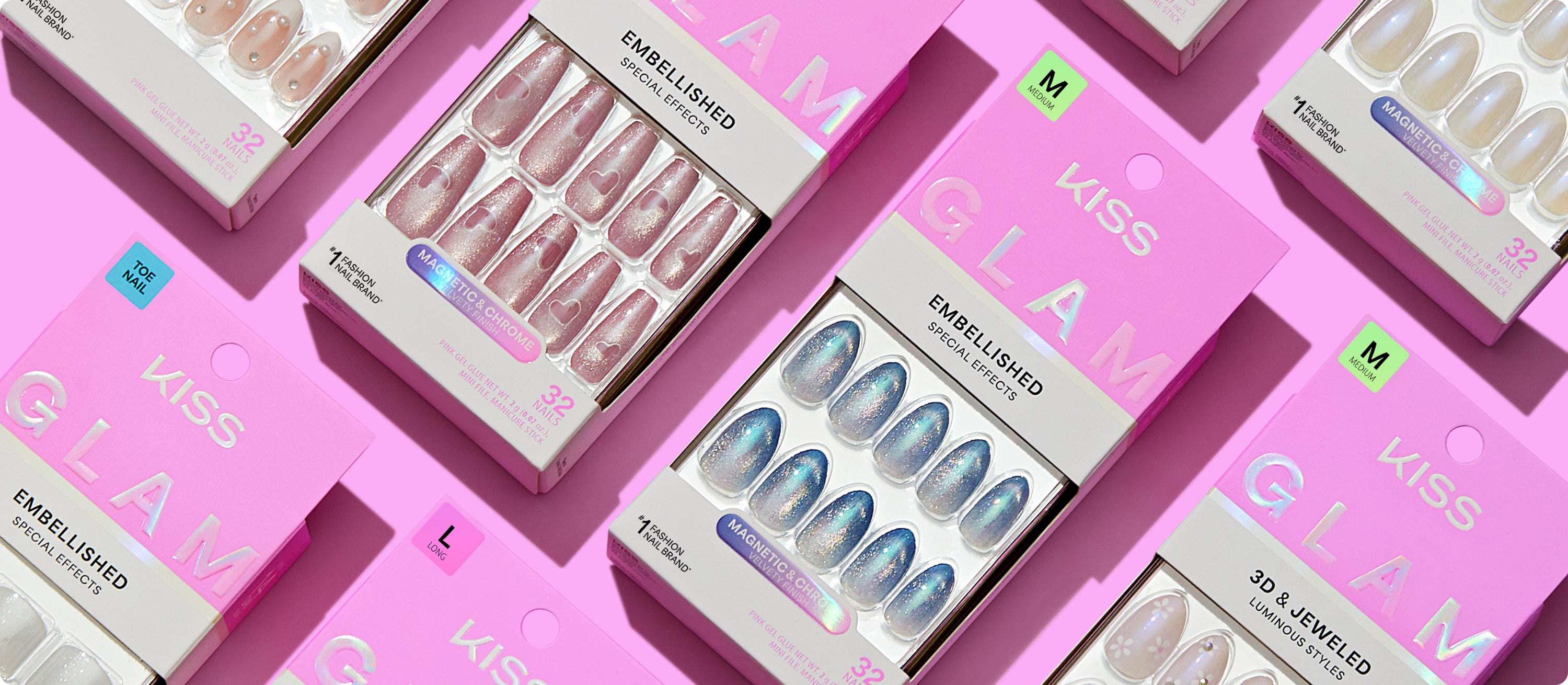 KISS nail polish display with embellished and magnetic effect manicure sets on pink background.