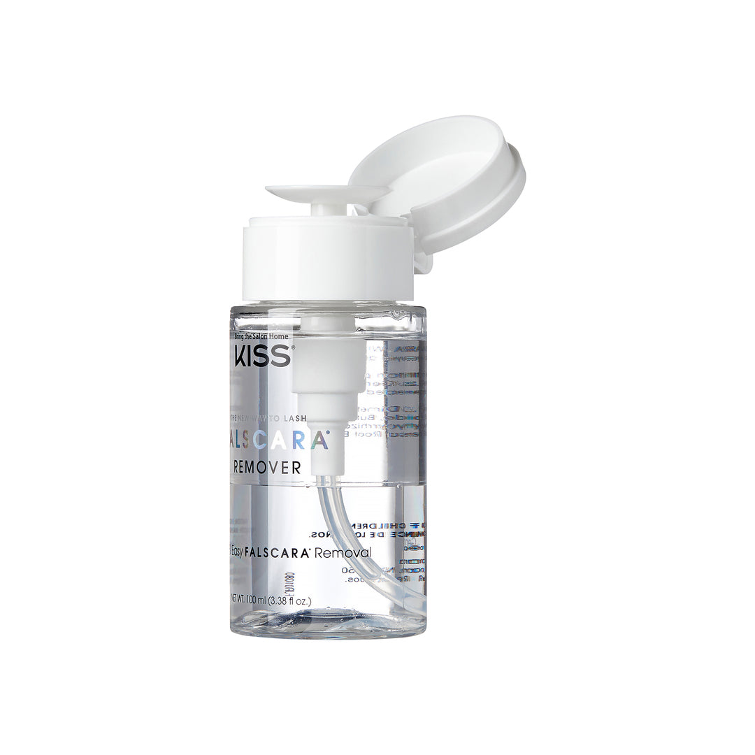 Clear plastic pump bottle of KISS Falscara Remover with white flip-top cap open, showing liquid inside and label for easy falscara removal.