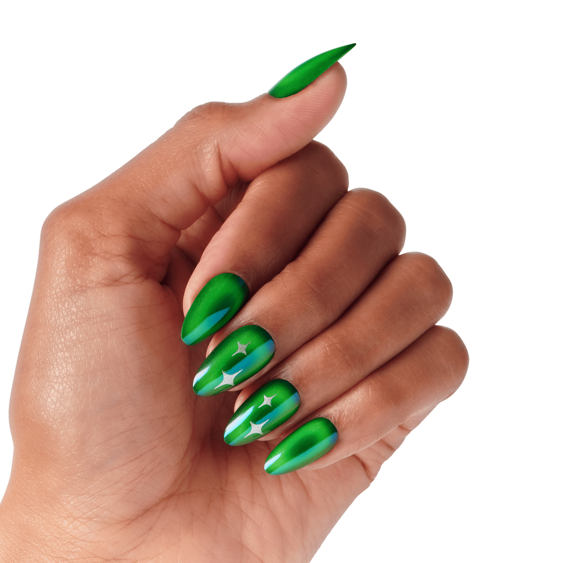 Hand with long, pointed nails painted in metallic green with silver star decals on the middle and ring fingers, shown against a black background.