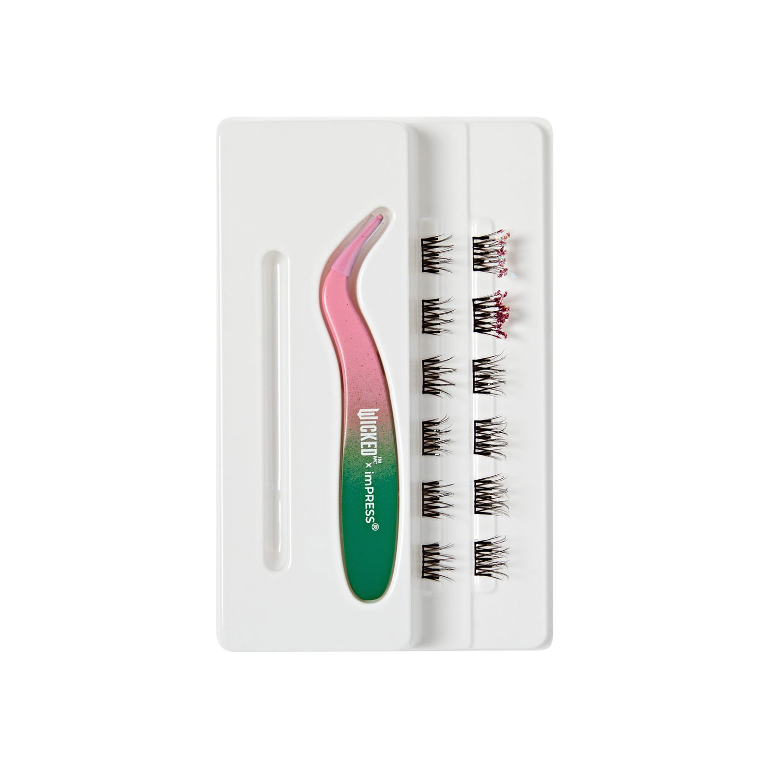 The image features a set of false eyelashes arranged on a white tray. The tray includes a pair of tweezers, which have a pink and green handle. The eyelashes are neatly organized in rows, showcasing a variety of styles, likely designed for easy application. The overall presentation is clean and organized, emphasizing the beauty and cosmetic purpose of the product.
