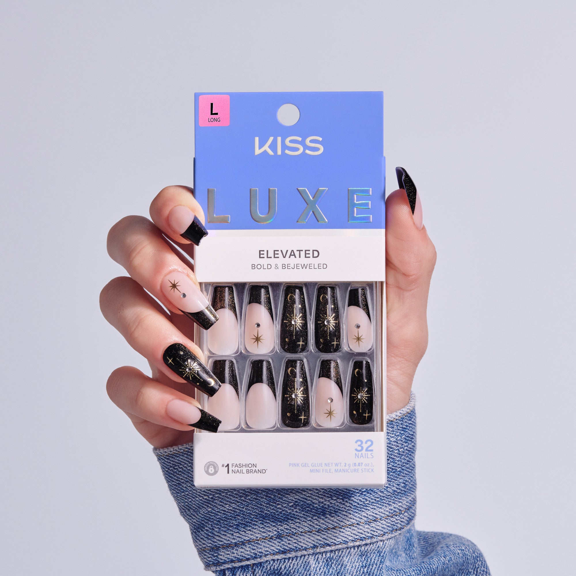 KISS Luxe Elevated press-on nails in black and nude with gold star designs, size L, 32 nails.