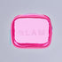 Bright pink cosmetic bag with "GLAM" text and turquoise zipper detail