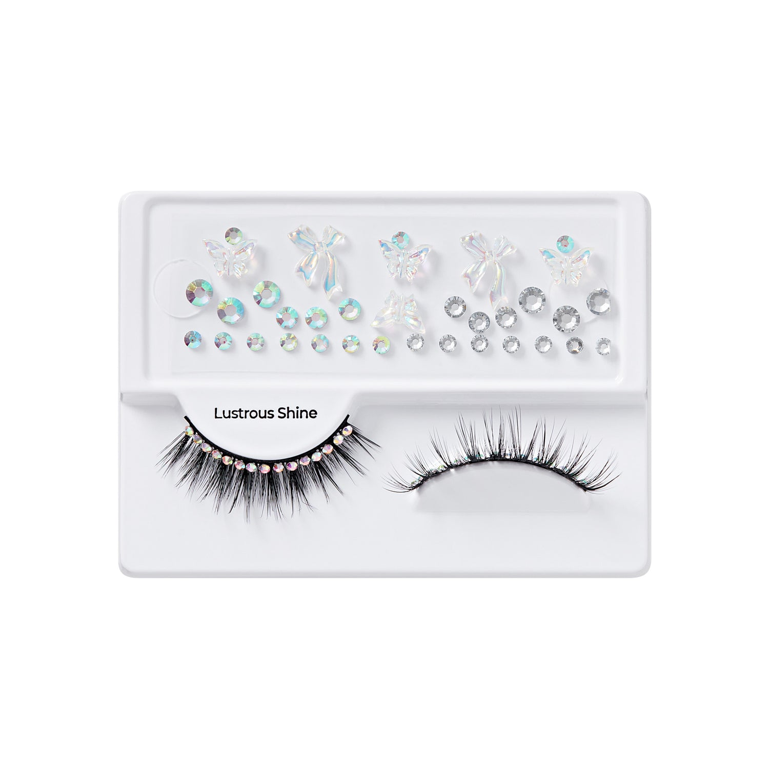 False eyelashes with attached iridescent rhinestones labeled \