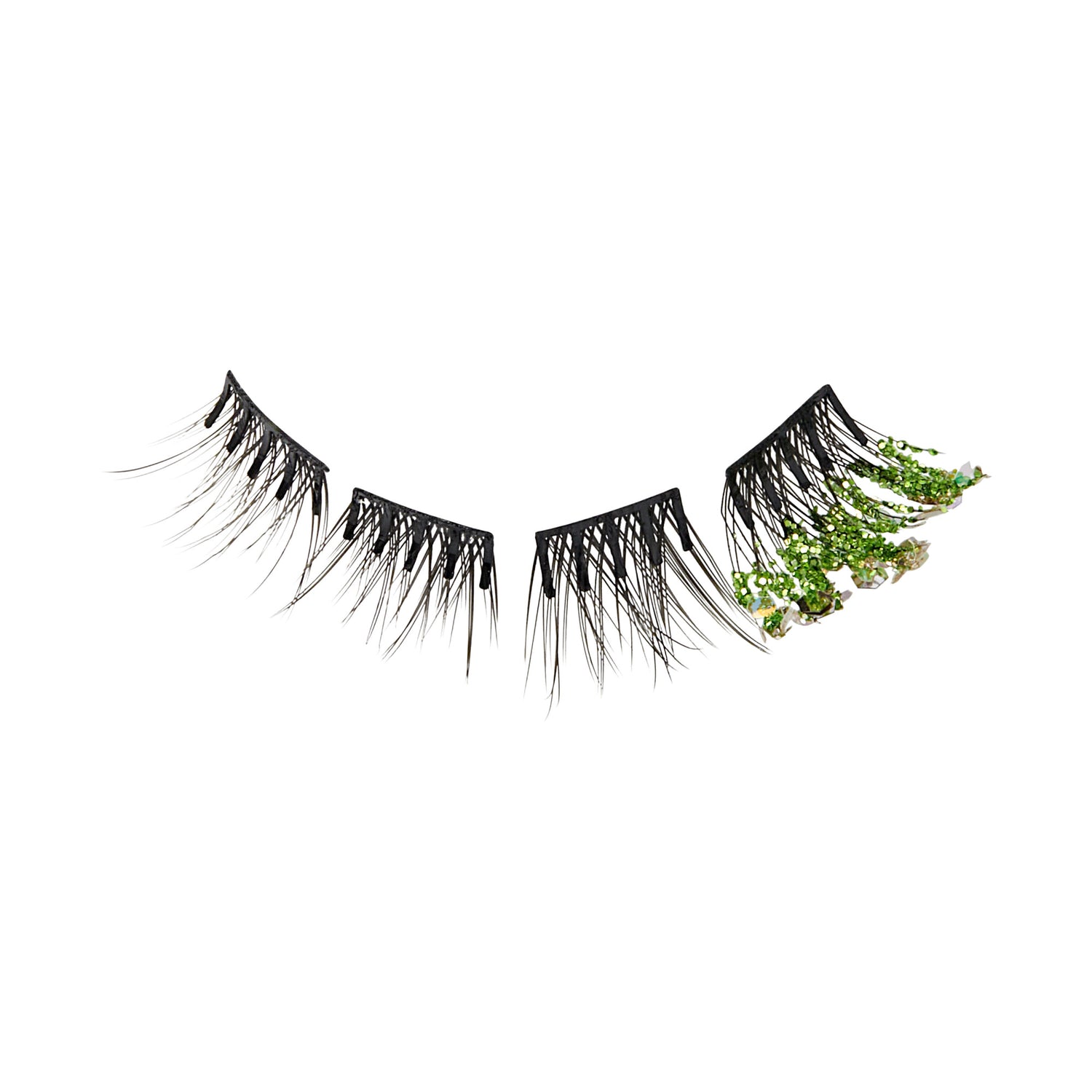 The image features a pair of false eyelashes. The lashes are predominantly black with a long, dramatic design. One side of the lashes has a unique touch, incorporating green elements and small decorative accents, adding a pop of color and a whimsical flair. The overall look is bold and eye-catching, suitable for a striking makeup style.