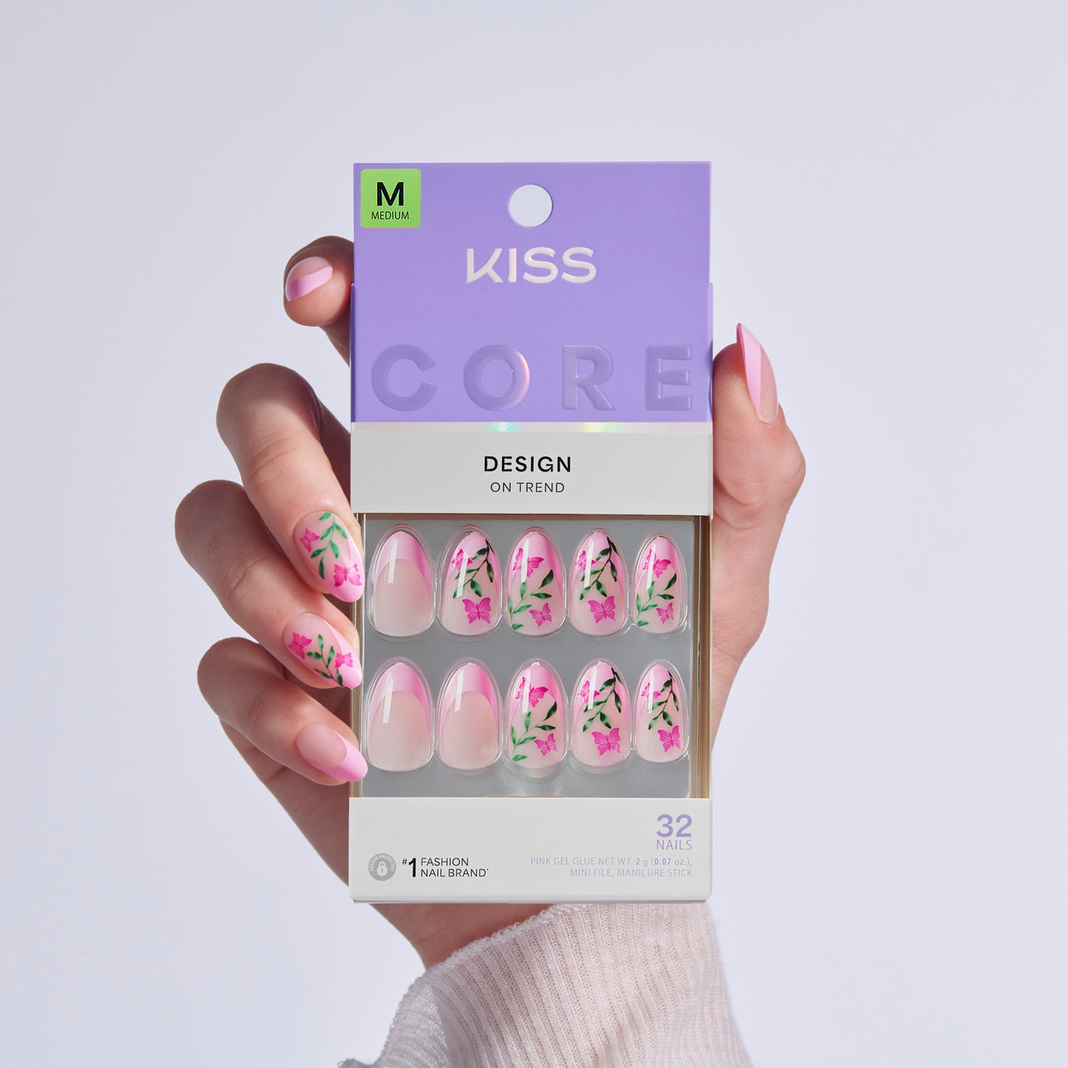 KISS Core Design press-on nails in Medium size with pink floral design, 32-piece set.