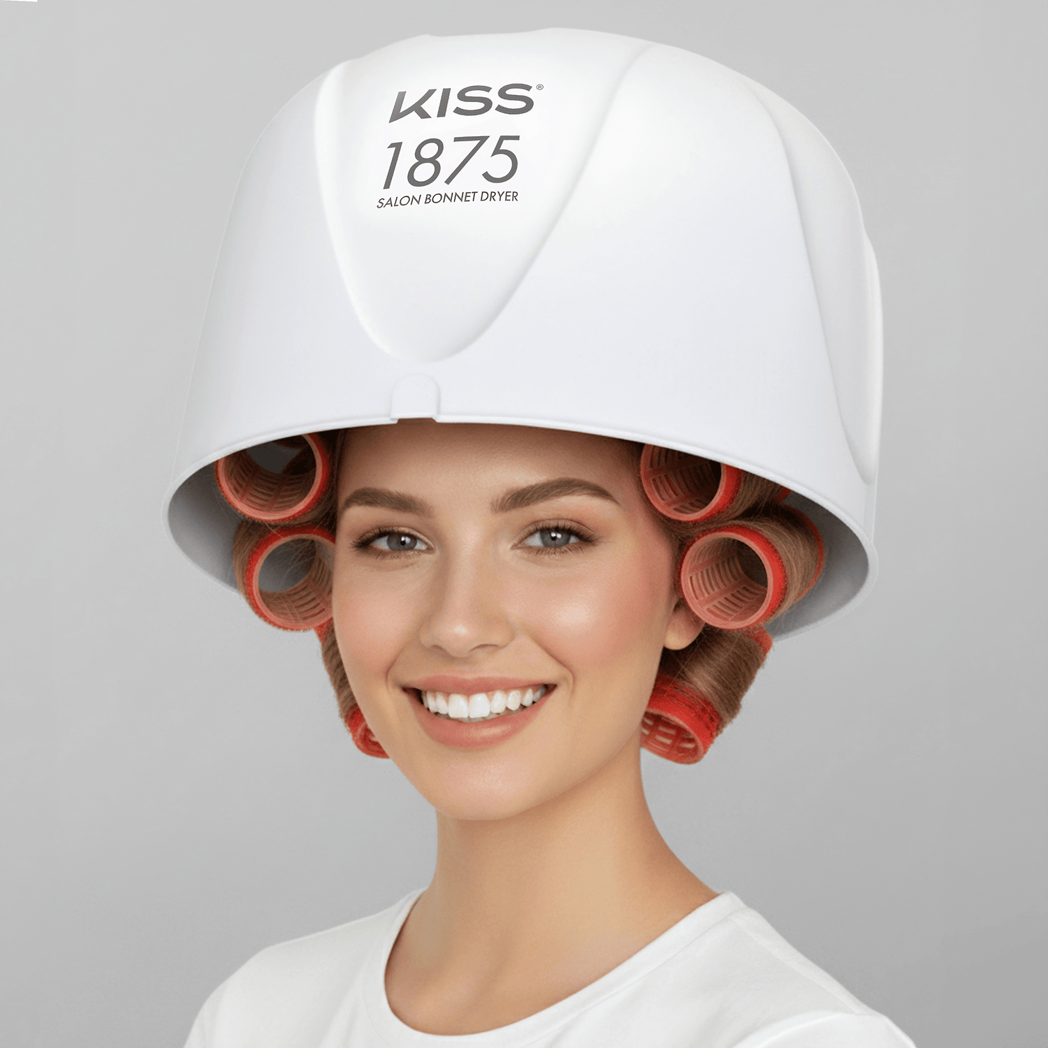 Smiling woman wearing a white salon bonnet hair dryer labeled \