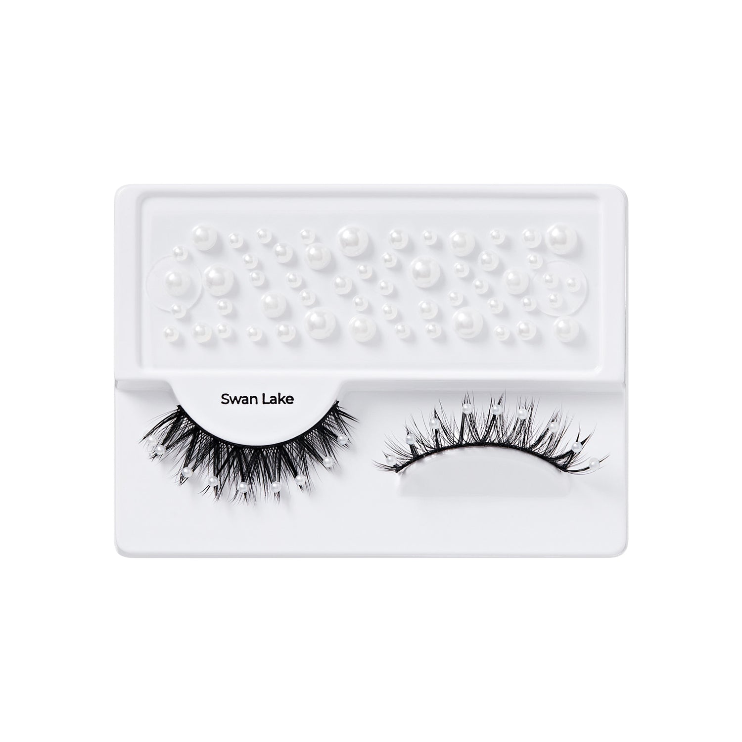 False eyelashes decorated with small white pearls named \