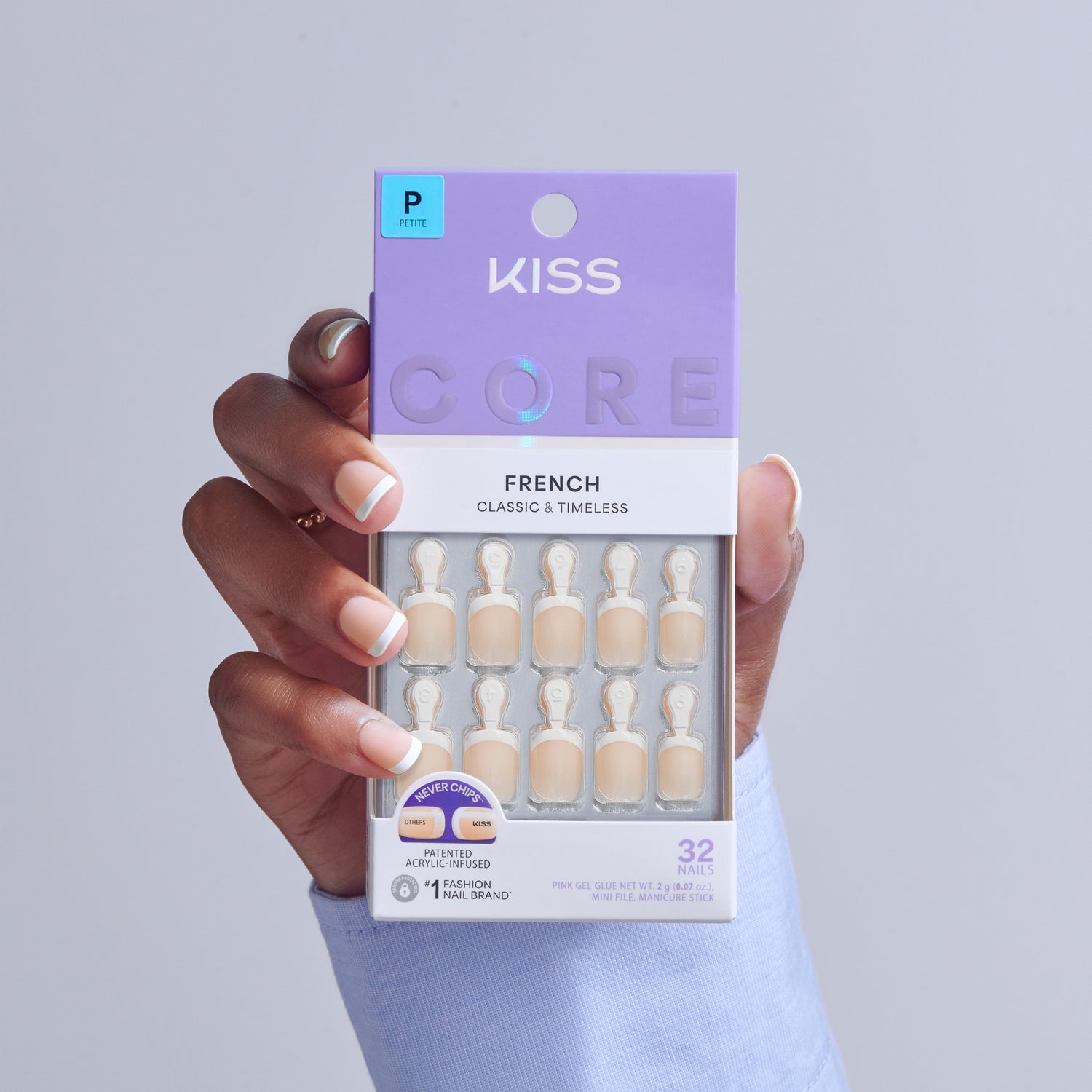 KISS Core French Classic &amp; Timeless press-on nails in Petite size, displayed in hand.