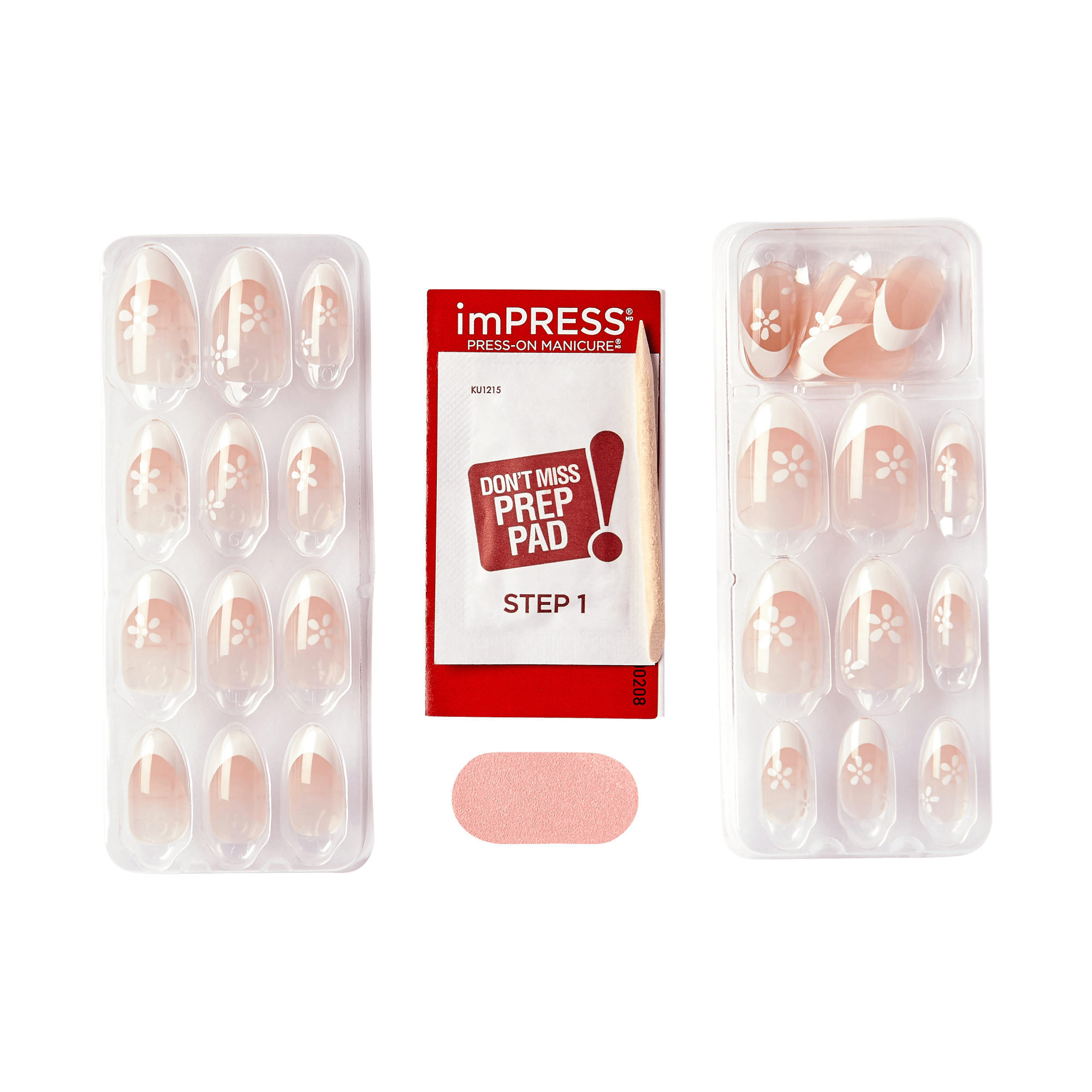 The image shows a set of press-on nails from the brand "imPRESS." The set includes two trays of press-on nails, each containing multiple nails of various sizes. The nails are a light pink color with white floral designs on some of them. In the center of the image, there is a red packet labeled "imPRESS PRESS-ON MANICURE" with the text "DON&