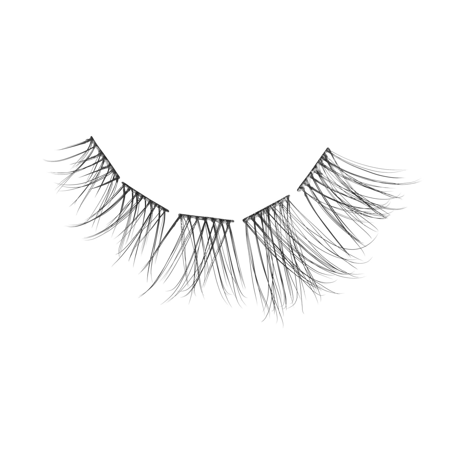 Pair of false eyelashes with dramatic layered strands on white background.
