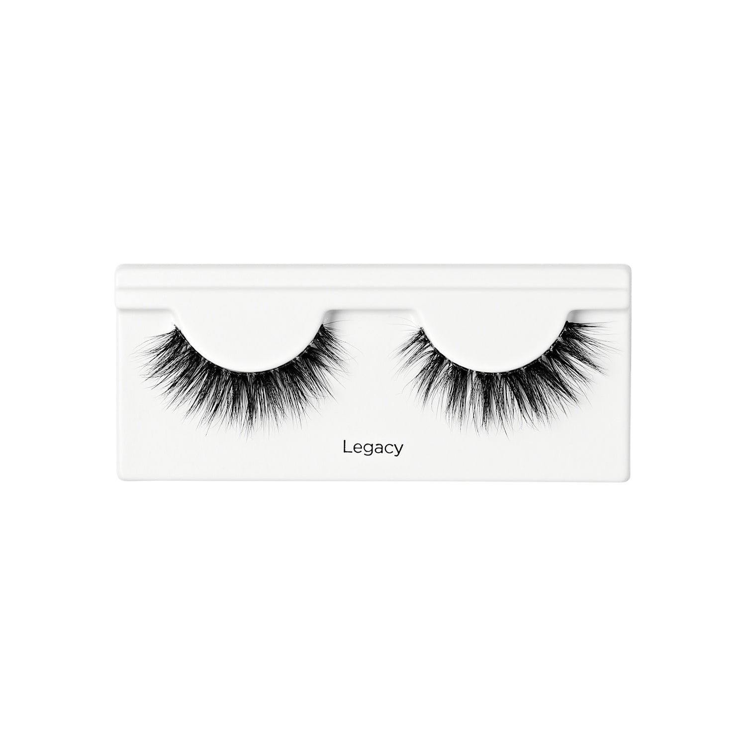 Pair of black, voluminous false eyelashes in white plastic packaging with \