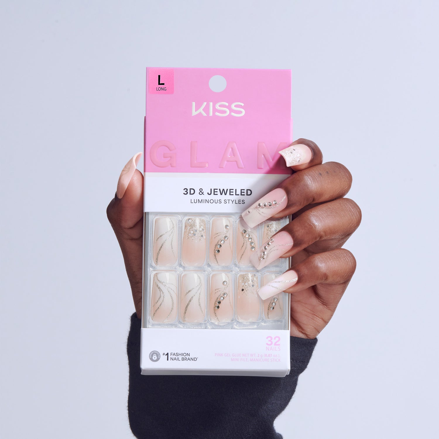 KISS Glam 3D &amp; Jeweled Luminous Styles press-on nails in long length on model&