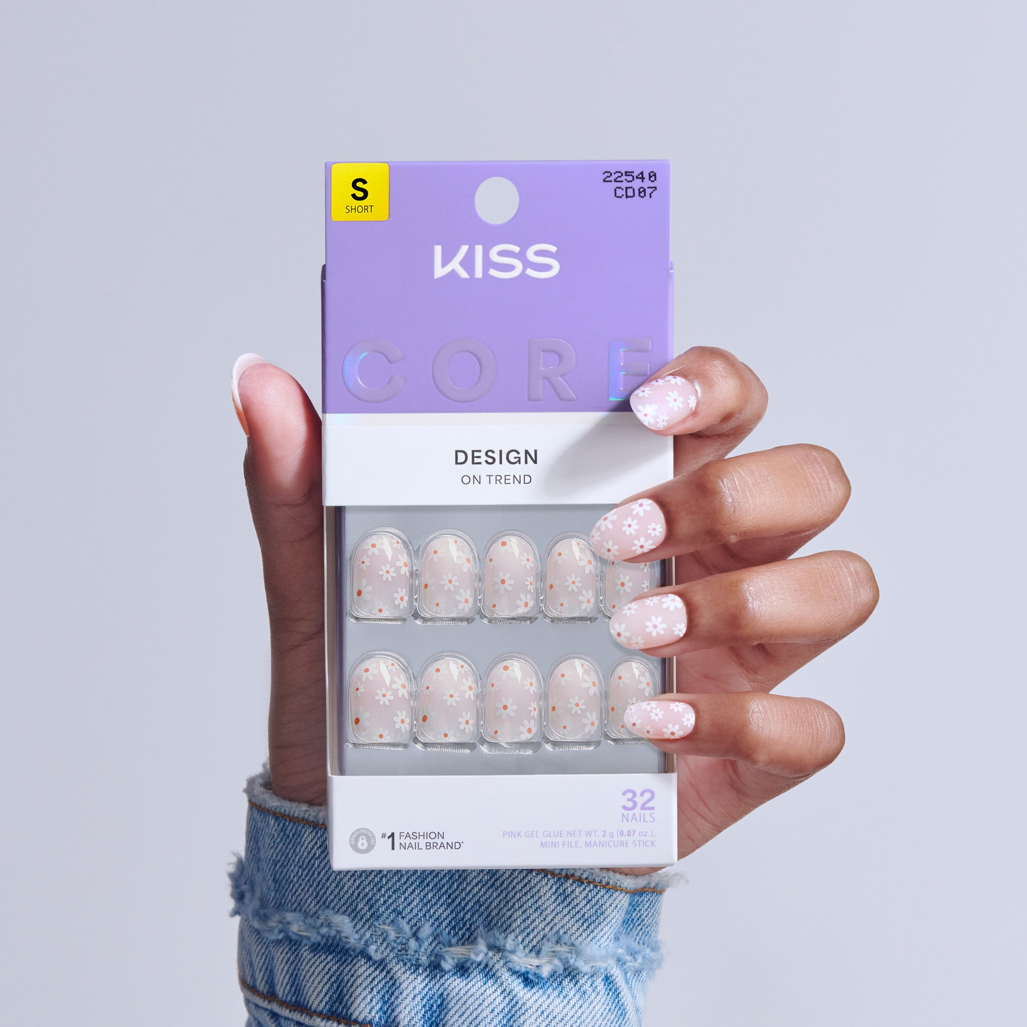 Kiss Core Design press-on nails in pink with glitter speckles, size short.