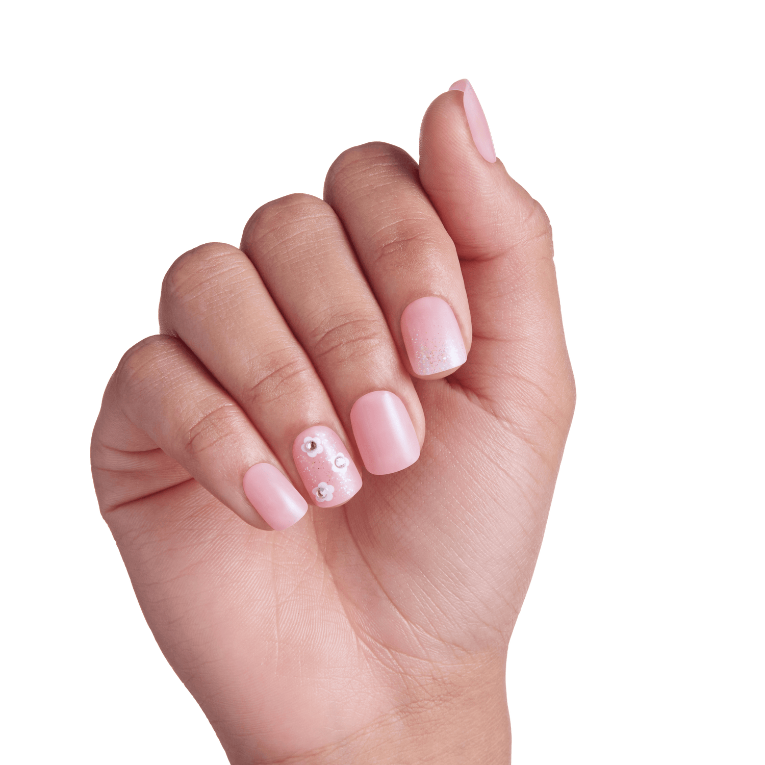 Manicured hand with pink nail polish and rhinestone accent on ring finger.