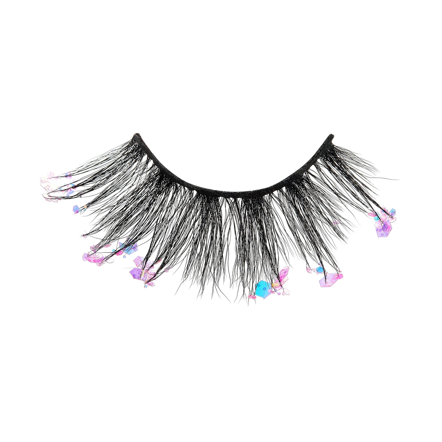 The image shows a single false eyelash strip. The eyelash strip is black and features long, thick lashes. Attached to the lashes are small, colorful embellishments, including pink and blue crystals or beads, which add a decorative and glamorous touch to the eyelash strip. The embellishments are sporadically placed along the length of the lashes, giving them a unique and eye-catching appearance.