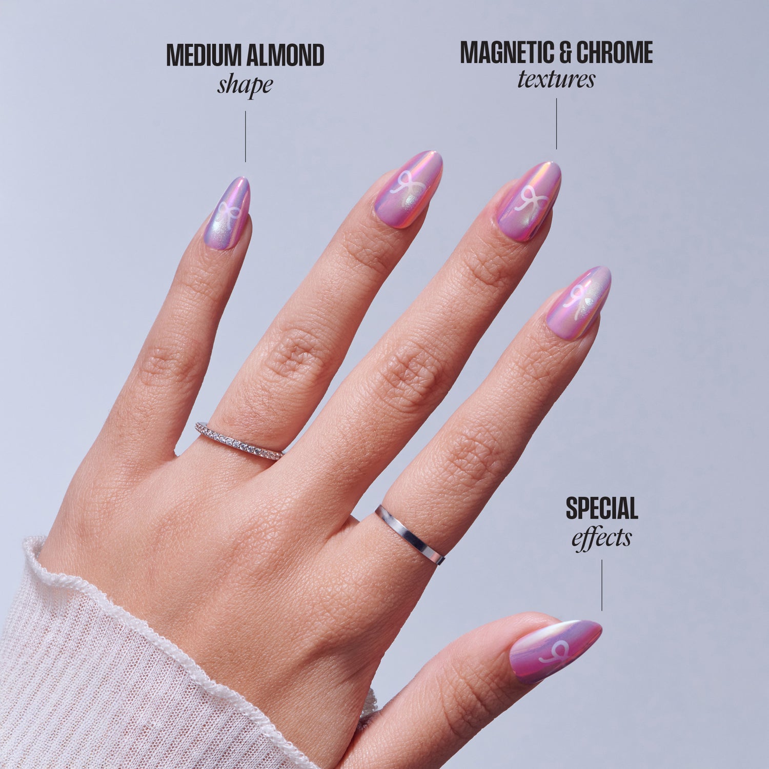 Medium almond nails with magnetic chrome and purple gradient designs featuring special effects.