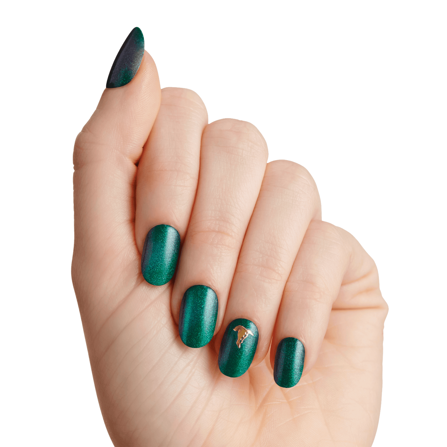 The image features a hand displaying a manicure with nails painted in a gradient of deep green and teal hues. The finish appears to be matte with a shimmering effect, showcasing a holographic quality that catches the light. One of the nails is adorned with a small gold accent, adding a touch of elegance to the overall look. The hand is positioned with fingers slightly curled, emphasizing the polished nails against a plain white background.