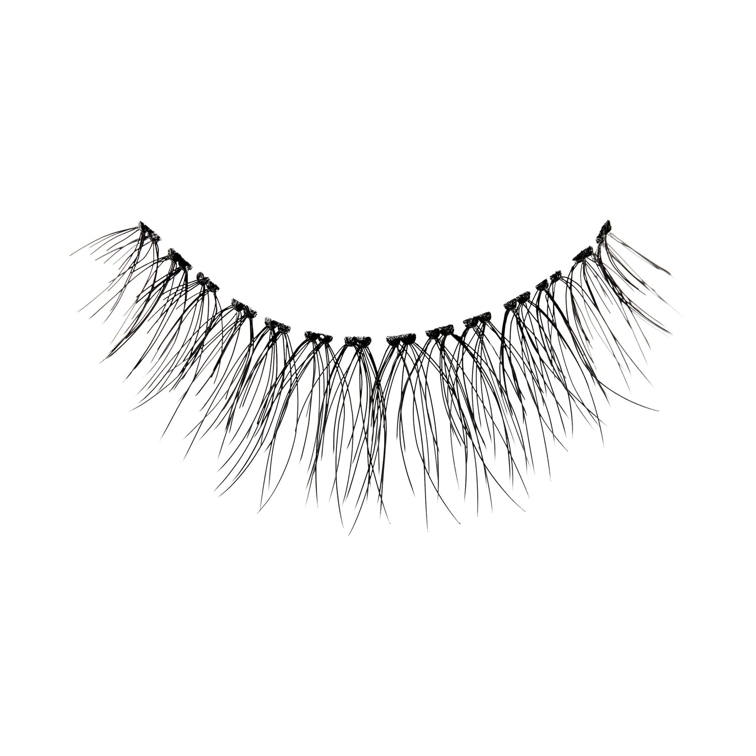 The image shows a single strip of false eyelashes. The eyelashes are black and appear to be long and wispy, with varying lengths to create a natural, voluminous look. The strip is curved to fit the natural shape of the eyelid. The lashes are densely packed at the base and taper off to finer tips.