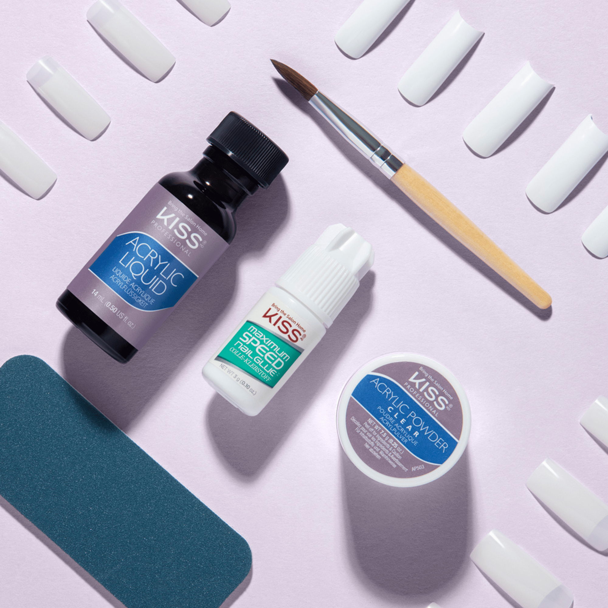 KISS French Acrylic Sculpture Kit components on a lavender background, including acrylic liquid, maximum speed nail glue, acrylic powder, a nail brush, white nail tips, and a teal nail file.