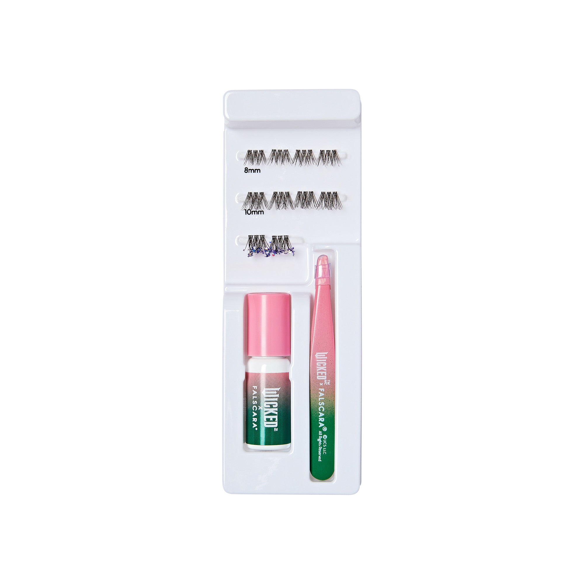The image features a beauty product kit designed for eyelash application. It includes several pairs of false eyelashes in different styles, a bottle of eyelash glue, and a pink applicator tool. The items are neatly arranged in a white tray, showcasing the various components for enhancing eyelashes. The packaging is clean and organized, emphasizing the ease of use for applying false lashes.