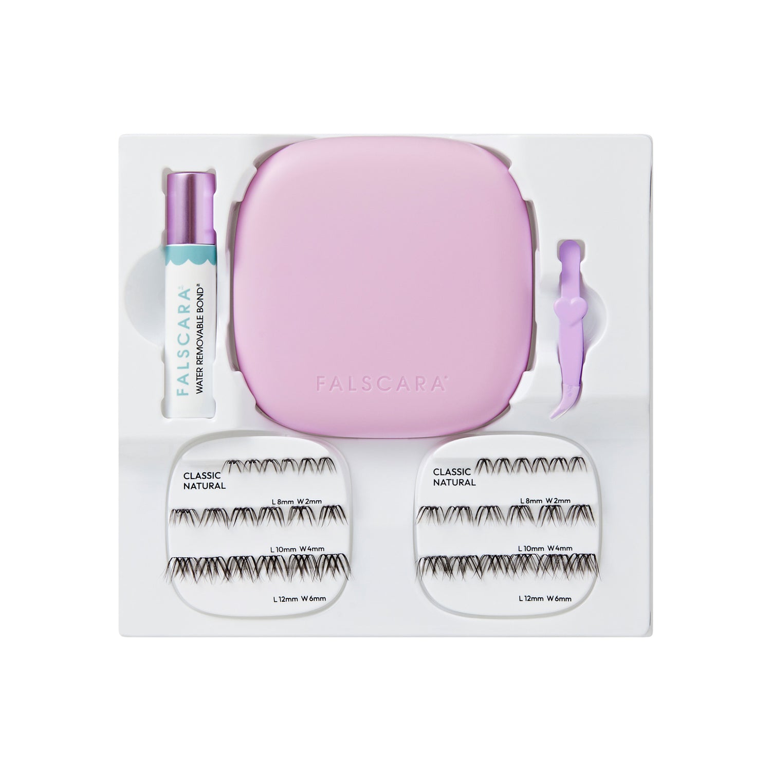 Falscara lash kit with pink case, mascara, applicator, and false lashes in multiple sizes.