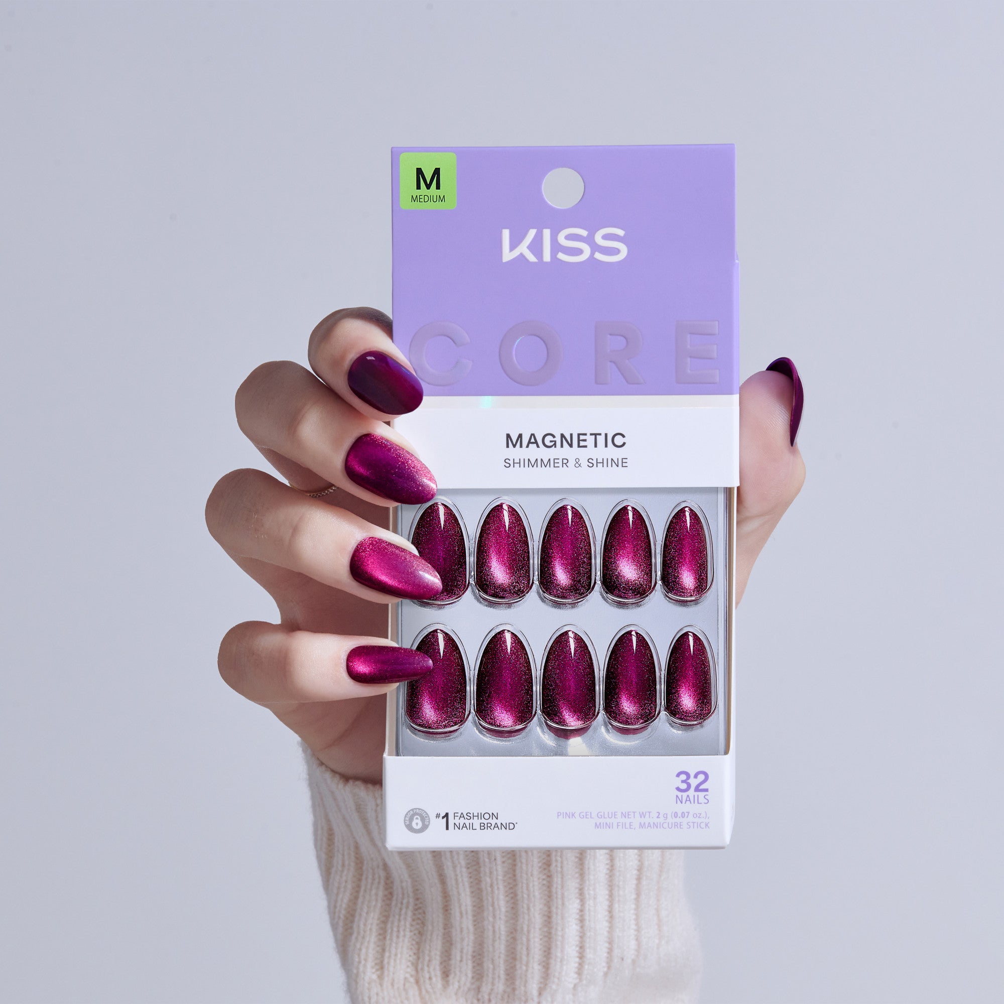KISS Core Magnetic press-on nails in deep magenta shimmer, size medium, 32 nails.