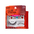 The image features a packaging for a limited edition set of false eyelashes called "Glam After Dark" by KISS. The kit includes one pair of lashes named "Hallow Prism" and a sheet of decorative stickers. The packaging is vibrant, with a red background and playful Halloween-themed graphics, including bats. The lashes are displayed prominently, showcasing their dramatic, wispy design. The stickers are colorful, featuring hearts and gems in various shapes, adding a fun, festive touch for Halloween looks.
