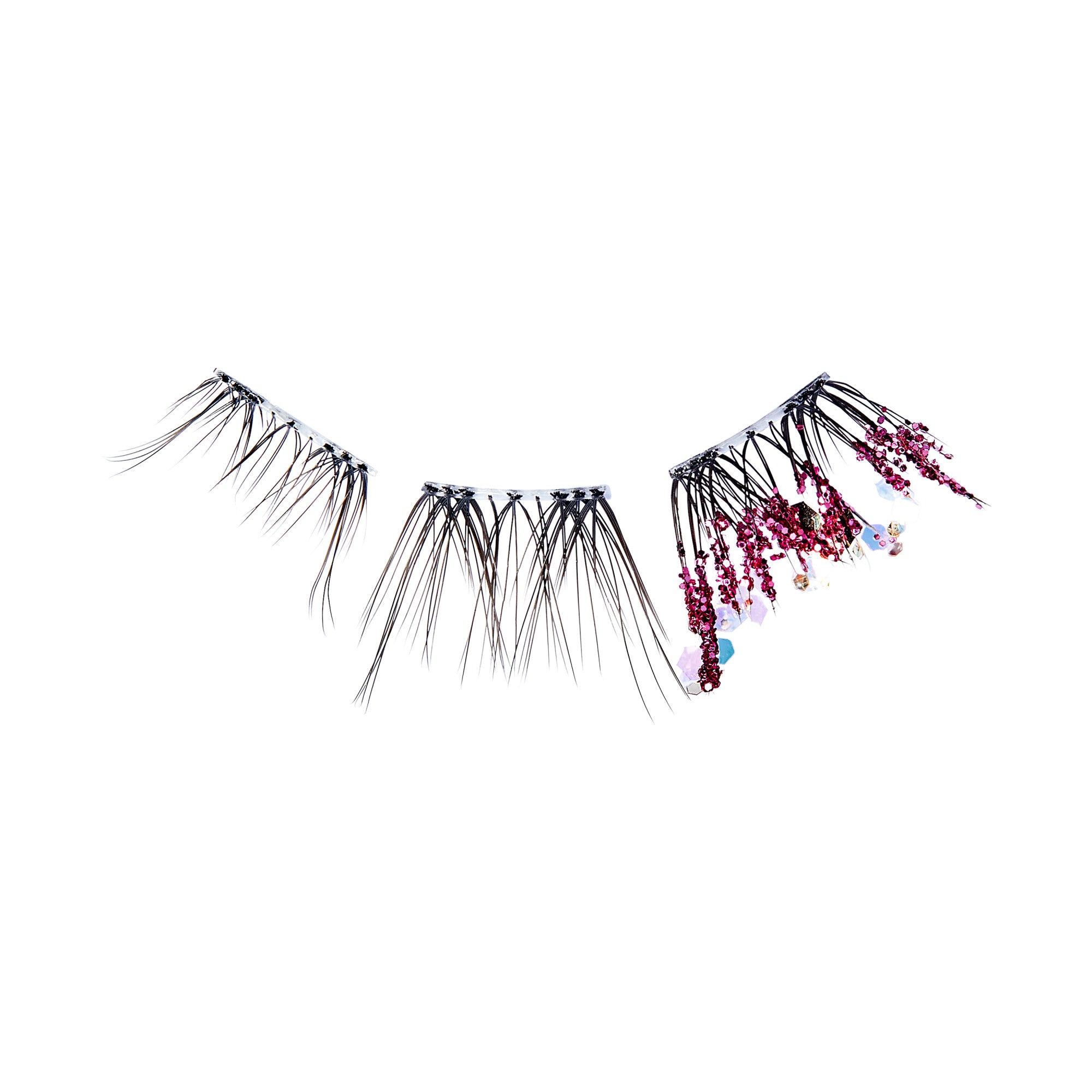 The image features a set of false eyelashes designed with a unique and artistic flair. The lashes are predominantly black, with varying lengths that create a dramatic effect. One section of the lashes is adorned with small, colorful embellishments, including tiny flowers and beads, adding a touch of whimsy and elegance. The overall look is striking and would likely be used for a bold makeup statement or a special occasion. The background is plain, emphasizing the intricate details of the lashes.
