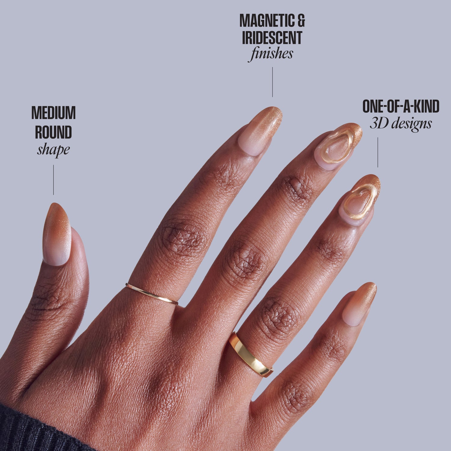 Magnetic iridescent press-on nails in medium round shape with 3D designs on dark skin tone hand.