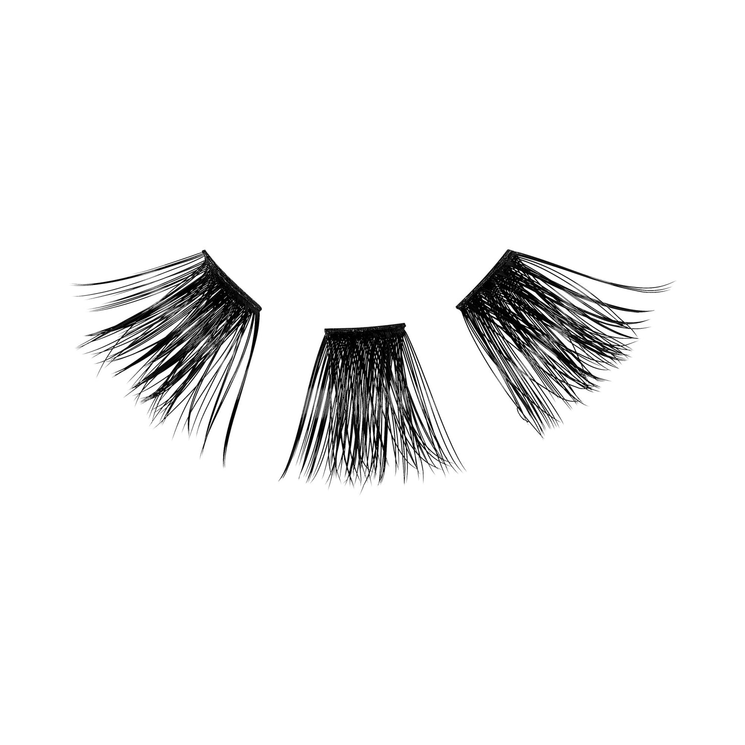 Three separate clusters of black false eyelash wisps arranged in a crescent shape on a white background, designed to add extra drama to natural lashes.