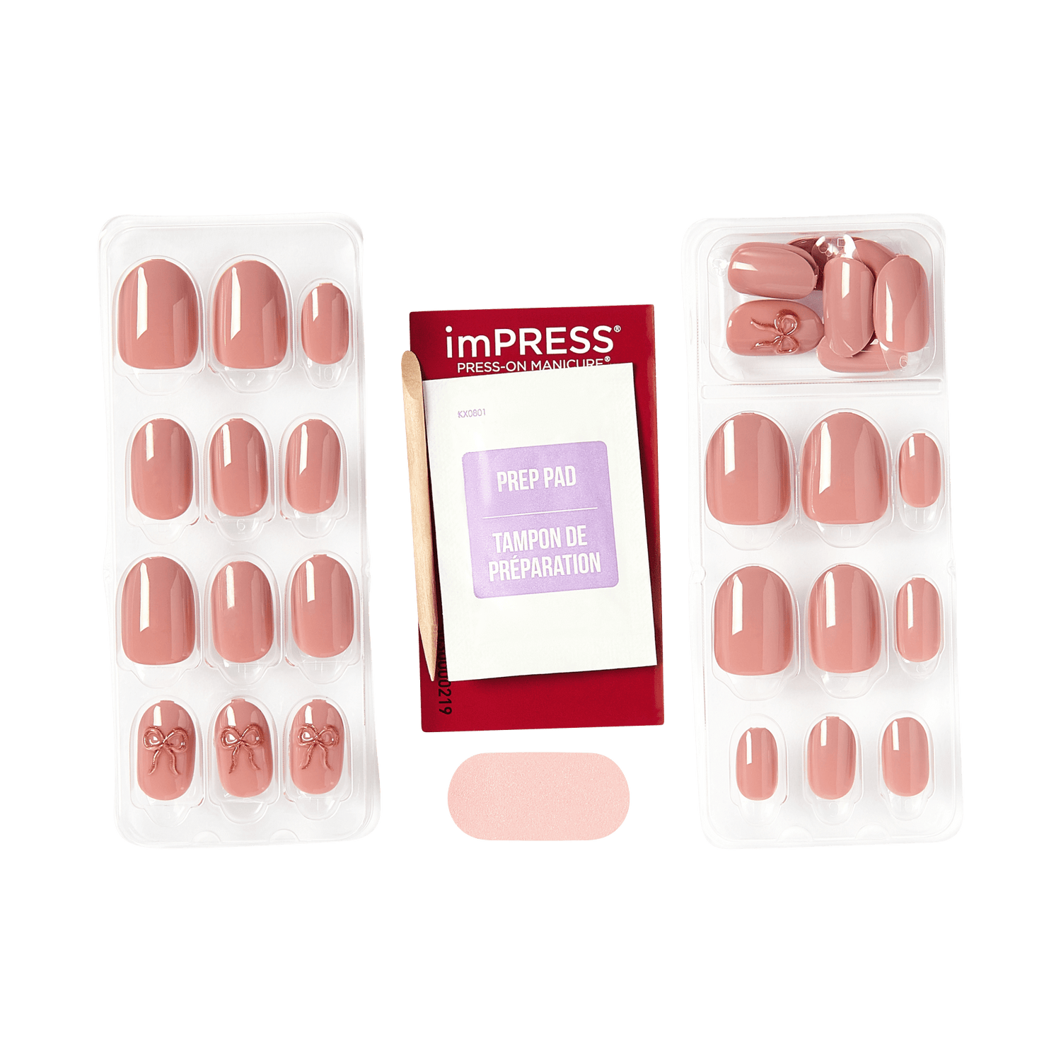 imPRESS Press-On Manicure nail kit with prep pad and bow-detailed nails in nude pink.
