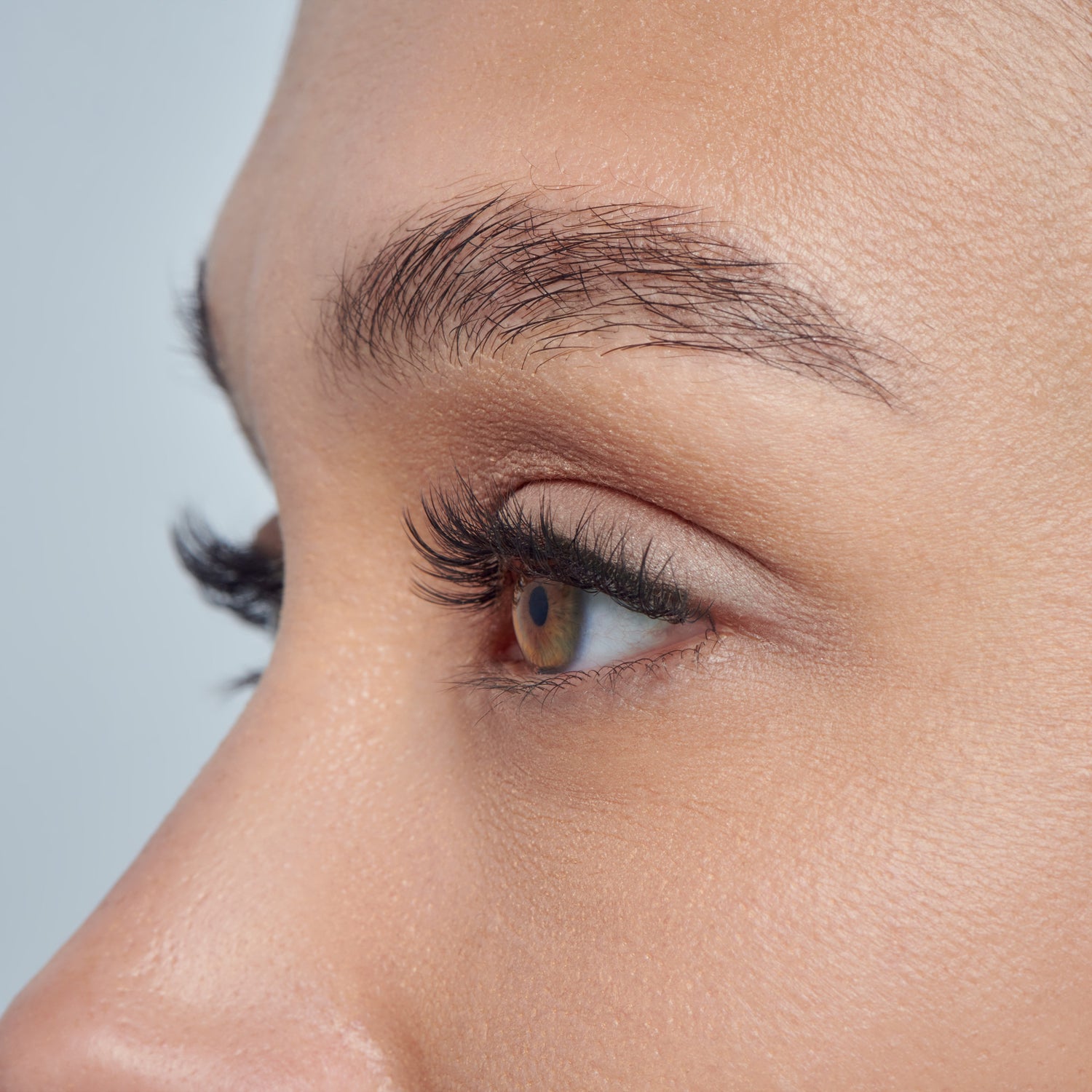 The image features a close-up profile of a person&