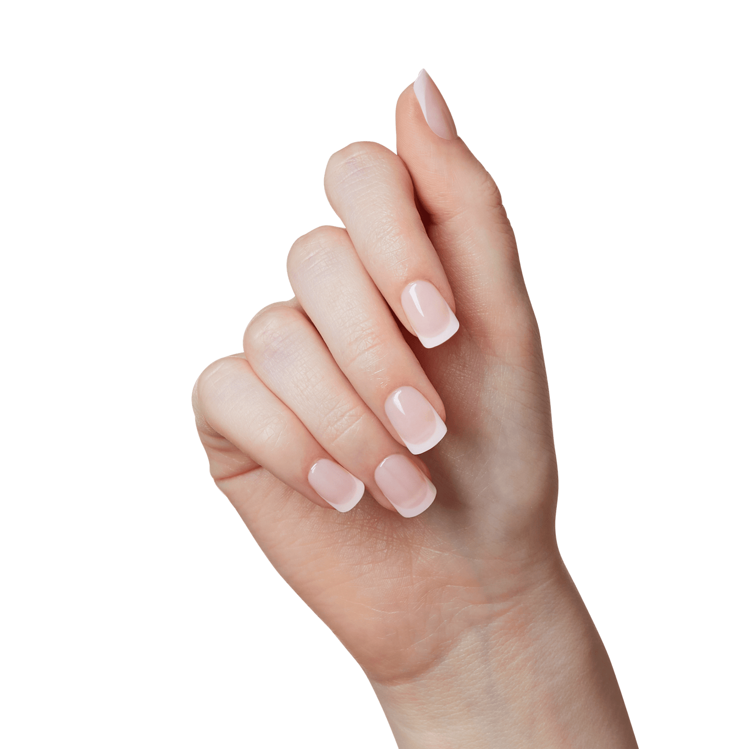 Hand with neatly manicured French press-on nails in soft pink with white tips, showing a natural and polished look.