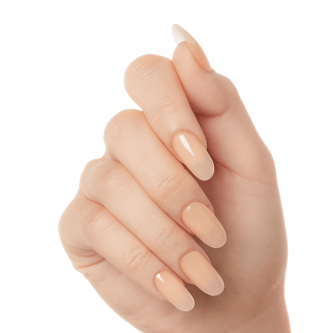 Close-up of a hand showing long, almond-shaped press-on gel nails in a glossy nude peach shade called Moonlight.
