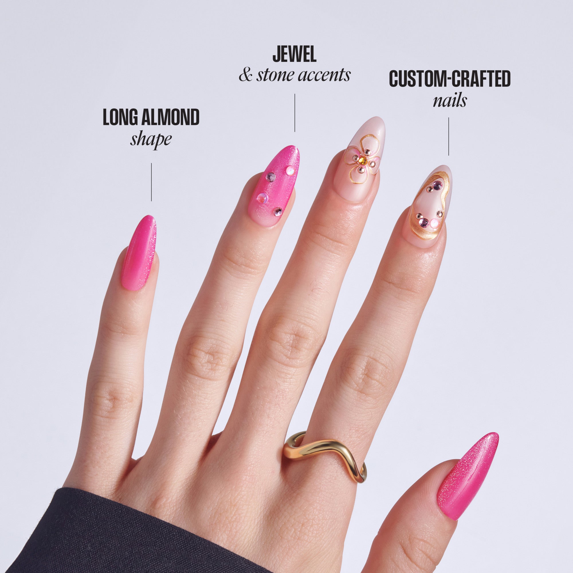 Four manicured nails displaying long almond shape, jewels, stone accents, and custom-crafted designs in pink and nude tones.