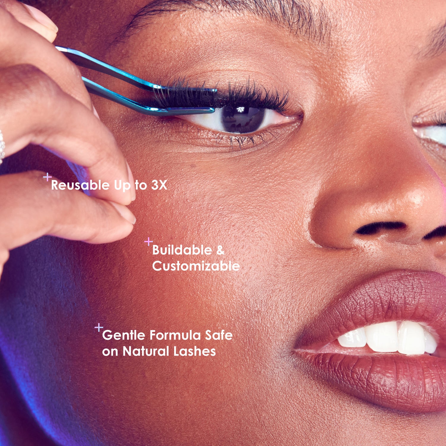Close-up of a person applying FALSCARA Extra Drama Wisps eyelash with blue tweezers, showing natural lashes. Text highlights: reusable up to 3 times, buildable and customizable, gentle formula safe on natural lashes.